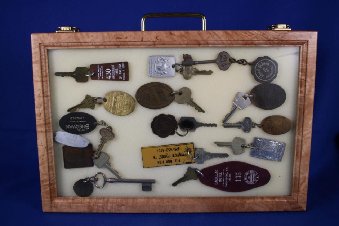 Display Case of 15 Vintage Hotel Keys: Including The Cadillac Motel in Owensboro, KY; Hotel Peabody in Memphis; Hotel Gibson in Cincinnati, OH; The Cheshire Lodge in St. Louis, MO; The Kentucky in Lousiville, KY; Hotel Beese; The Sherman i