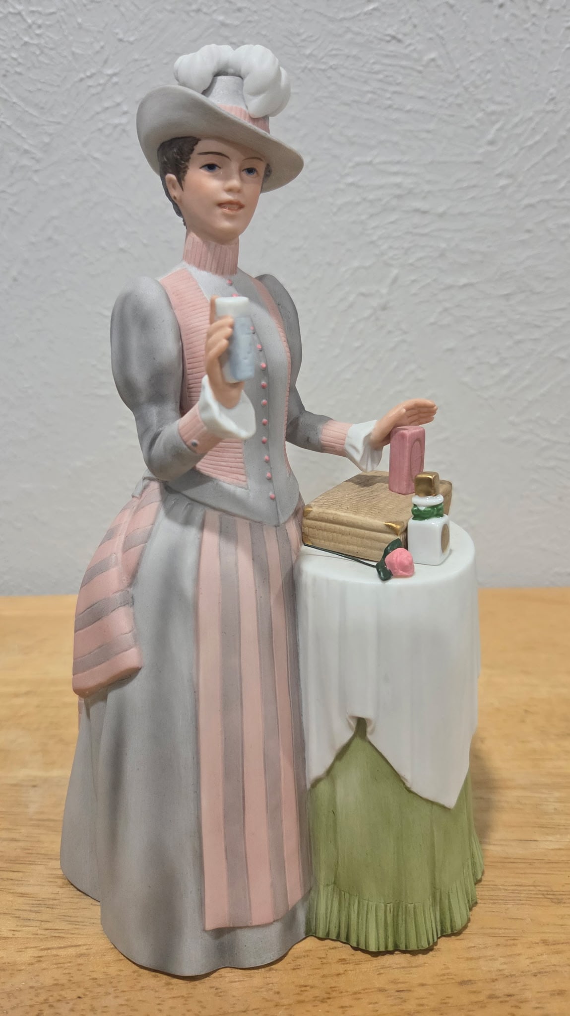1984 Avon Mrs. Albee: this vintage porcelain Avon figure is a part of the President's Club Award Edition. It depicts a woman in Victorian - era clothing. These figurines were presented to Avon representatives in