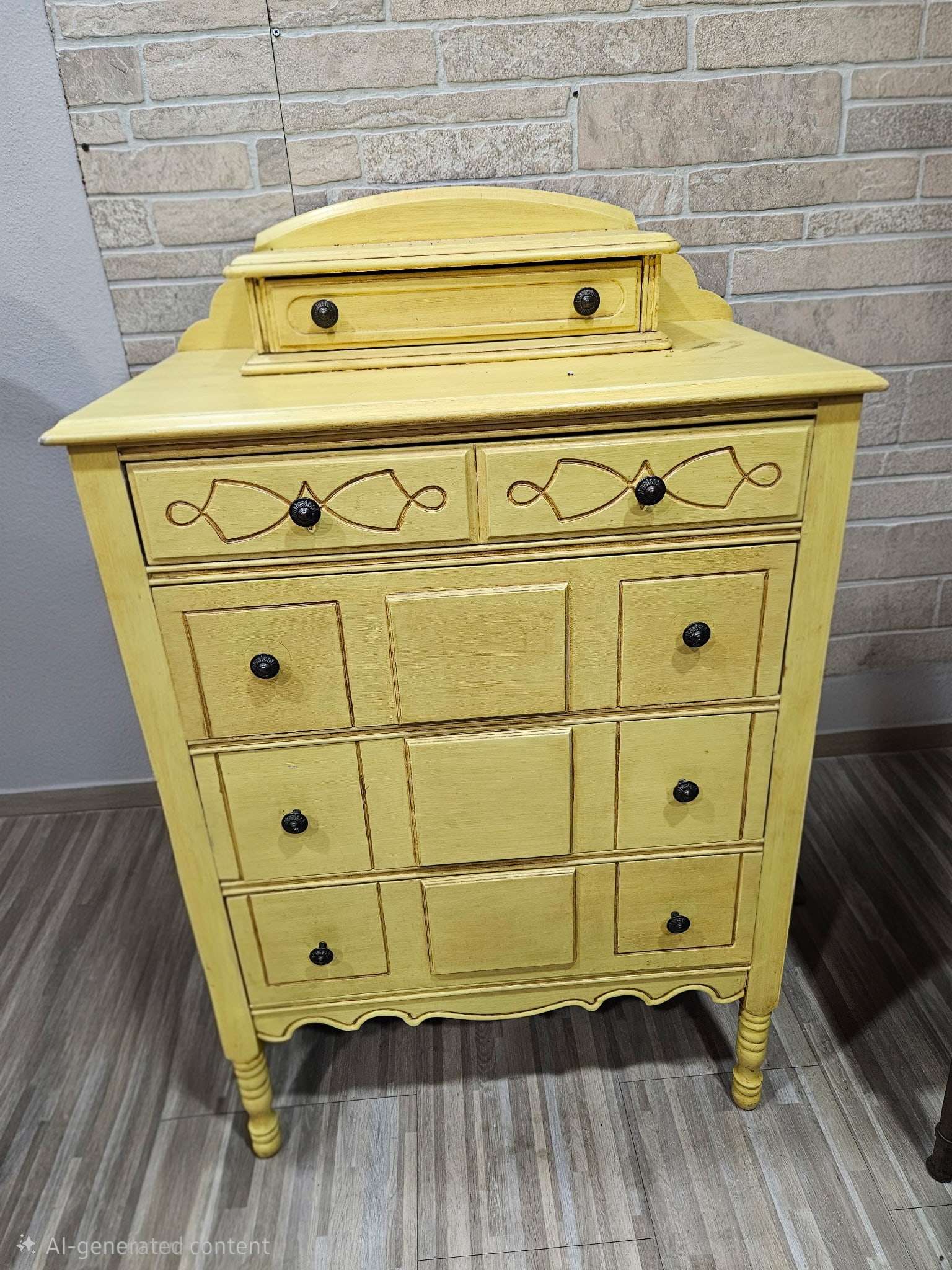 Vintage Yellow Chest of Drawers: This vintage chest of drawers has decorative dark trim lines and dark hardware.