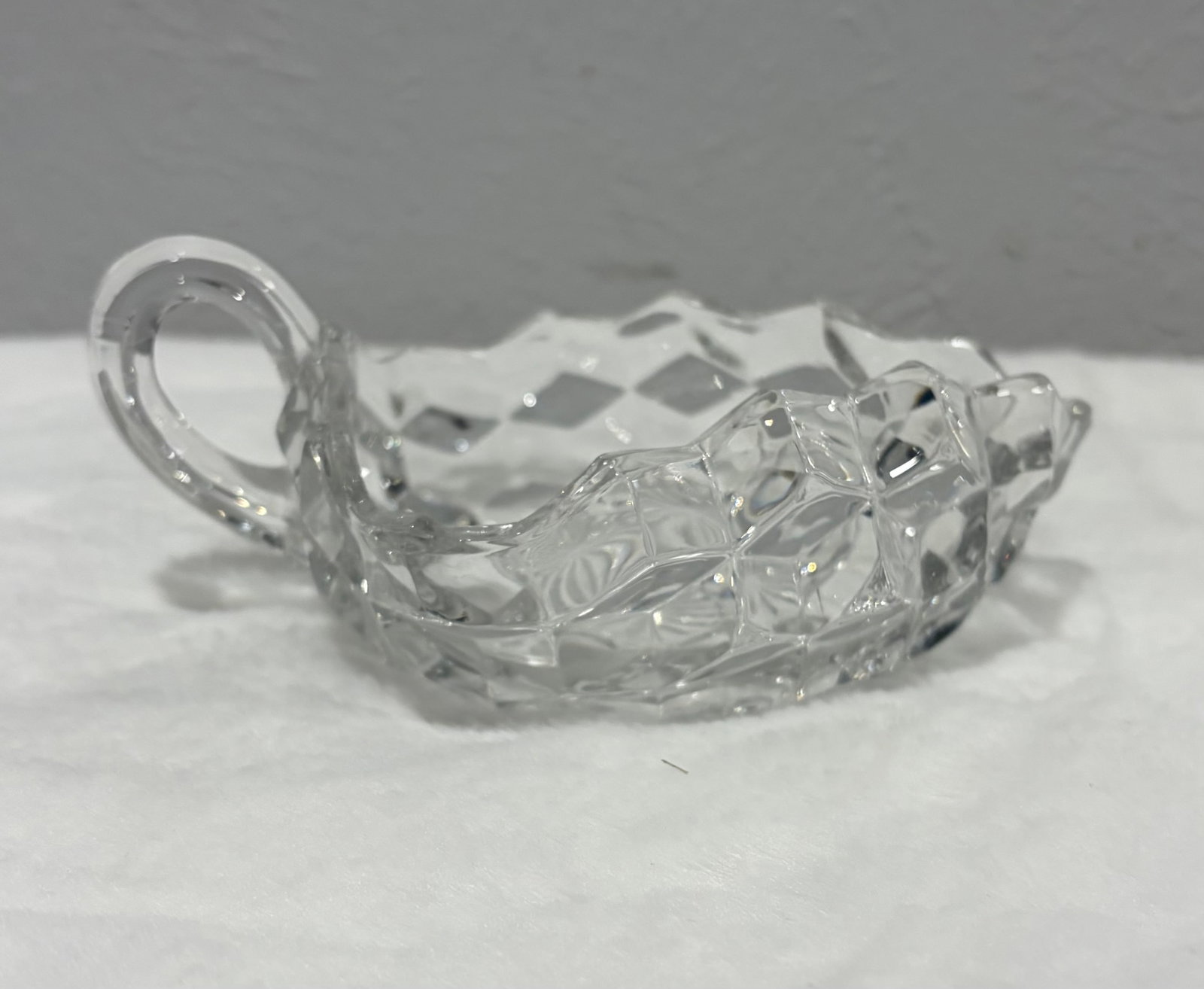 Vintage Fostoria American Clear Small dish with Handle: Vintage Fostoria small dish with handle. No chips, No Breaks. Condition Like New.