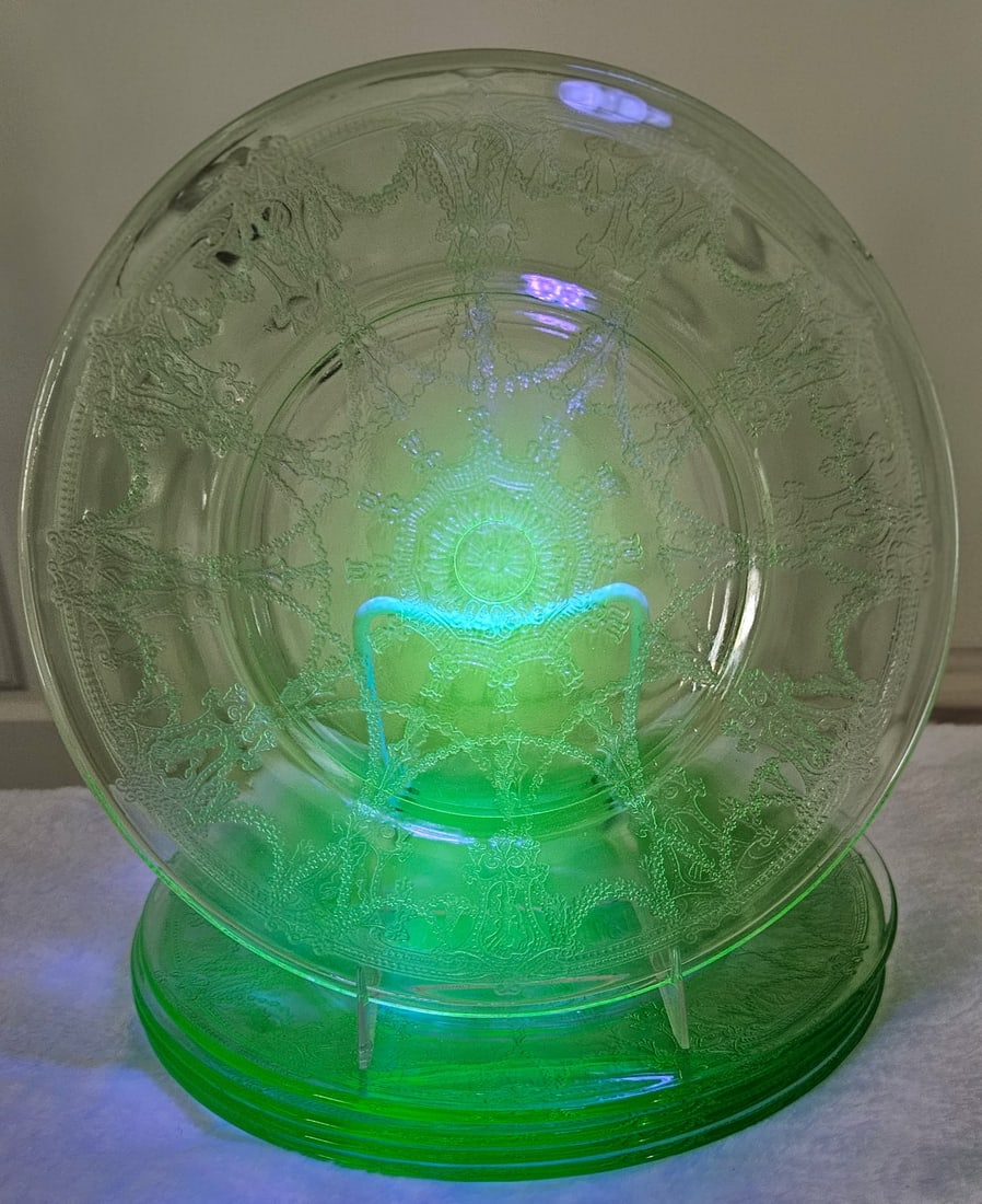 Uranium Glass - Plate Lot: These are 7 RARE Anchor Hocking depression glass (uranium glass) plates. Each piece features the Cameo pattern and have an eye catching glow under black light. These were likely produced between 1929 