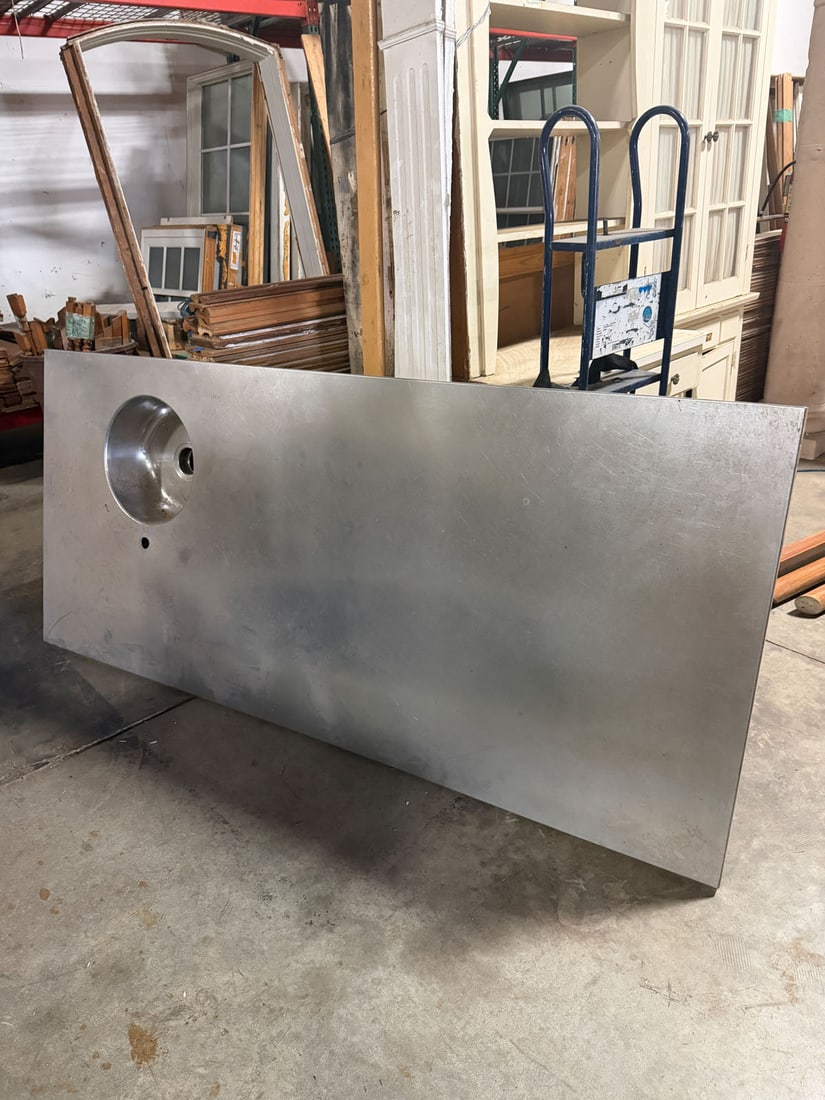 Custom fabricated stainless steel counter top with sink: Custom fabricated stainless steel counter top with integrated sink. Perfect for an indoor island or outdoor kitchen workspace.Measurement: 89" x 39.5"