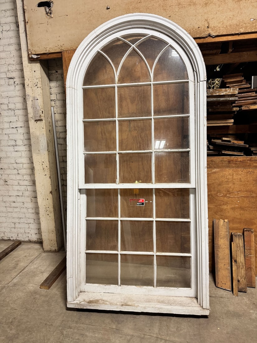 Reclaimed double hung arched top wood window: Reclaimed vintage double hung arched topped 9/9 wood window. Measurements: 43.5" w x 99" t x 5" d