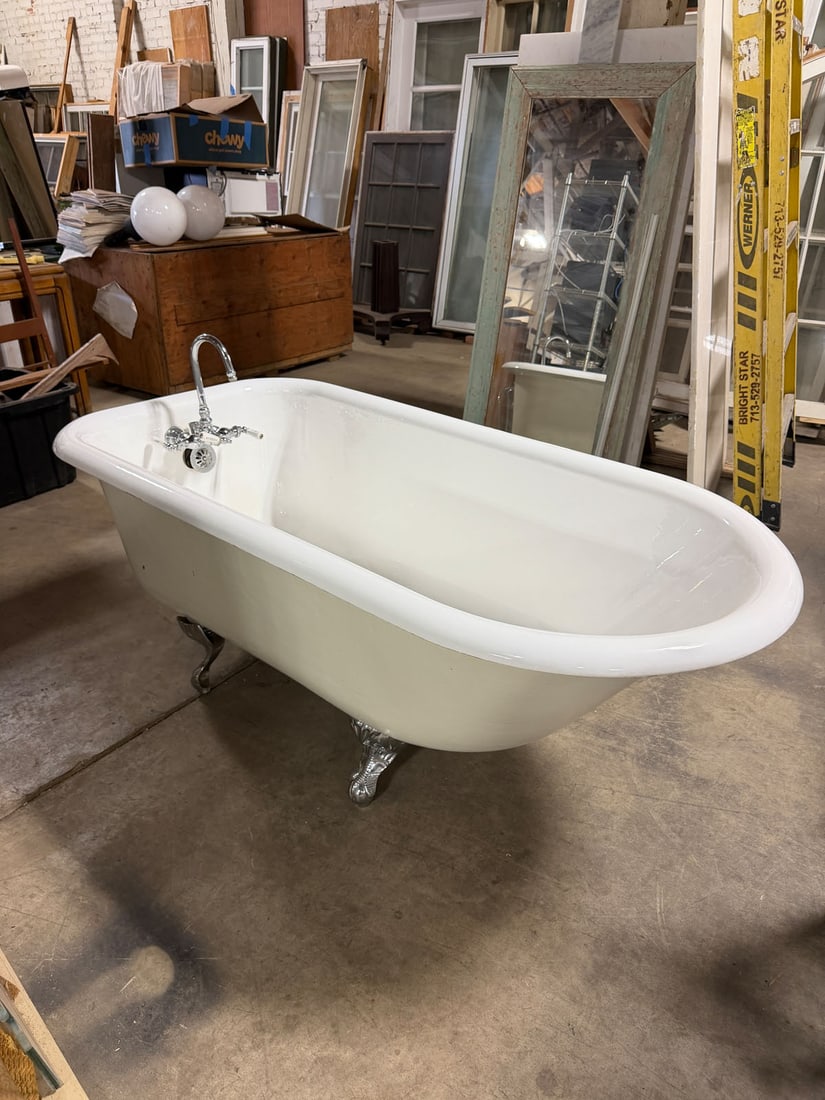Reclaimed vintage cast iron claw foot tub with chromed feet and fixture (1 of 7)