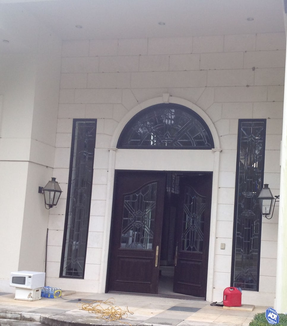 Redwood Double Entry door with sidelights and arched transom: Custom redwood double entry doors with leaded and beveled glass arched uppers with pair of leaded and beveled glass sidelights and arched topped leaded and beveled glass transom.This is a magnificent 