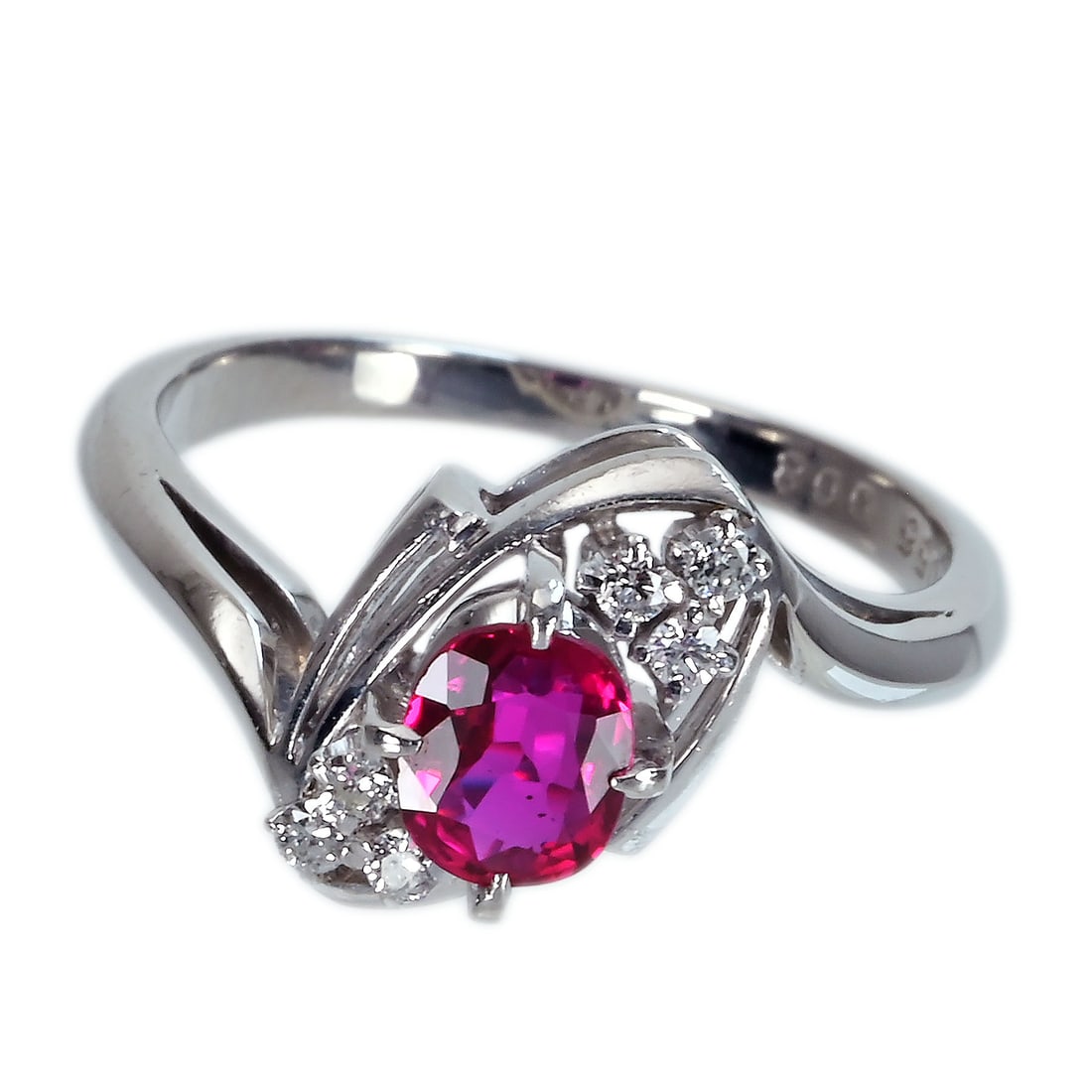 Pt900 Ruby Ring: Type: Ring Metal:PlatinumWeight4.9gramsRuby:0.56ctDiamond:0.08ctSize:5 ½(US)Condition: Pre-OwnedSigned By: N/A