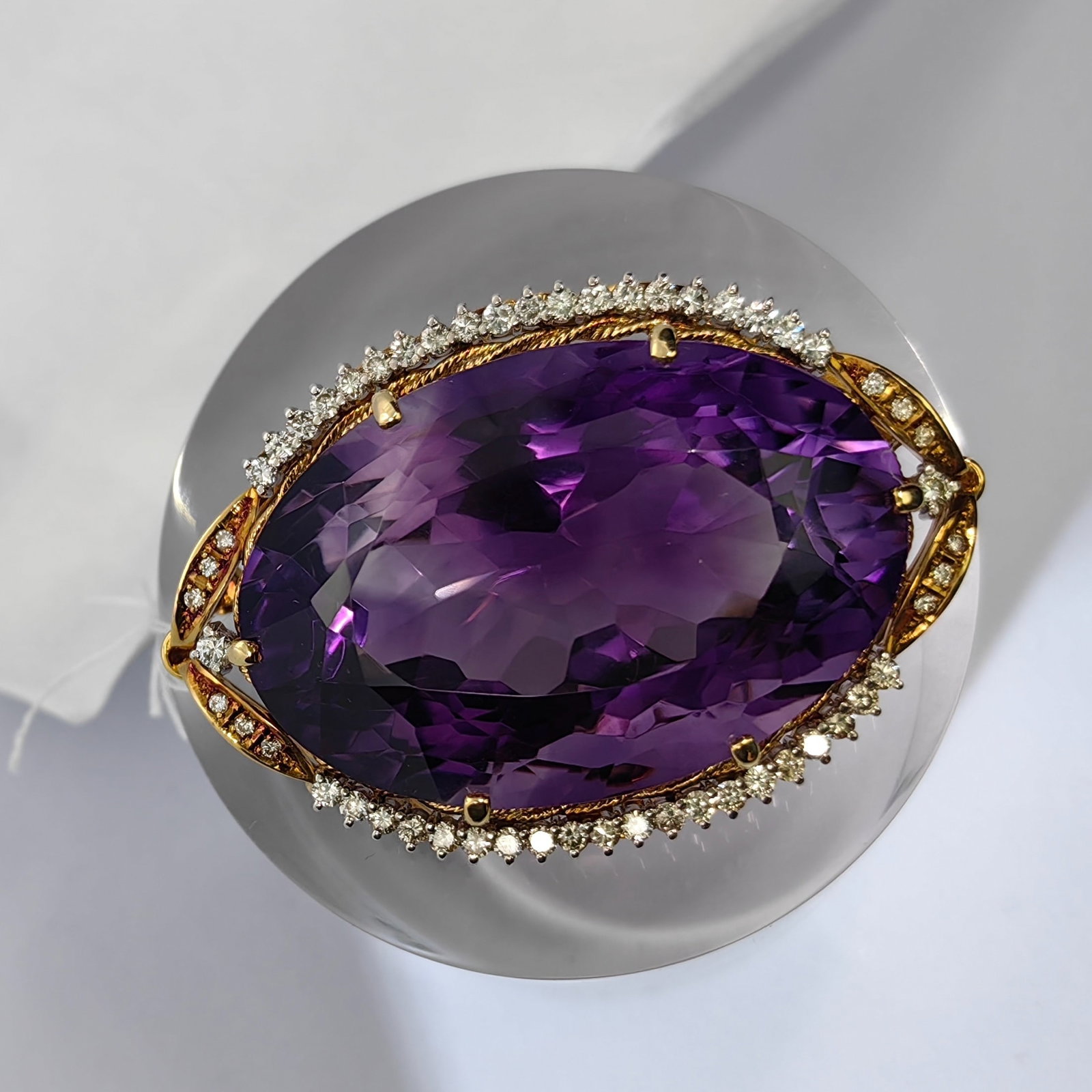 K18/PT900 Amethyst Diamond Brooch: Type: Brooch Metal:K18 Yellow Gold/Platinum Amethyst:93.78ct Diamond:1.20ct Size:N/A Signed By: N/A