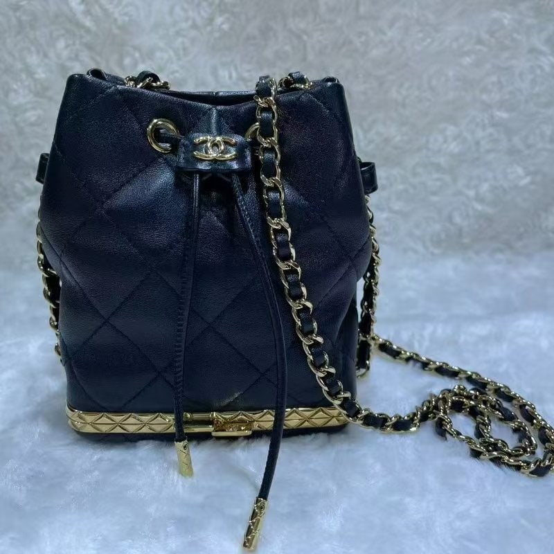 CHANEL Black Quilted Lambskin Leather Small Bucket Bag With Gold Hardware: Item Name:Chanel Black Quilted Lambskin Leather Small Bucket Bag With Gold Hardware Brand: CHANEL Model No.:32004874 Size:11cm*14cm*8cm Color:Black Material:Lambskin Accessories:N/A