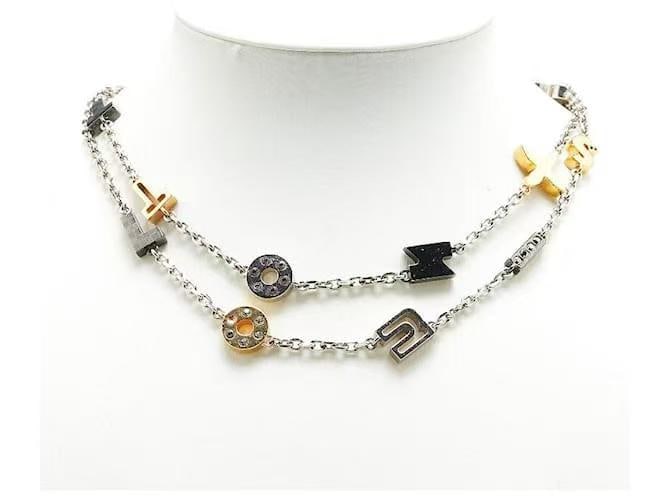 LOUIS VUITTON Love Letter Timeless Necklace: Item Name:Louis Vuitton Love Letter Timeless Necklace Brand:Louis Vuitton Model No.:M65253 LE 0153 Sizs:94cm Material:Metal/Strass Color:Black/Gold/Sliver Accessories:N/A