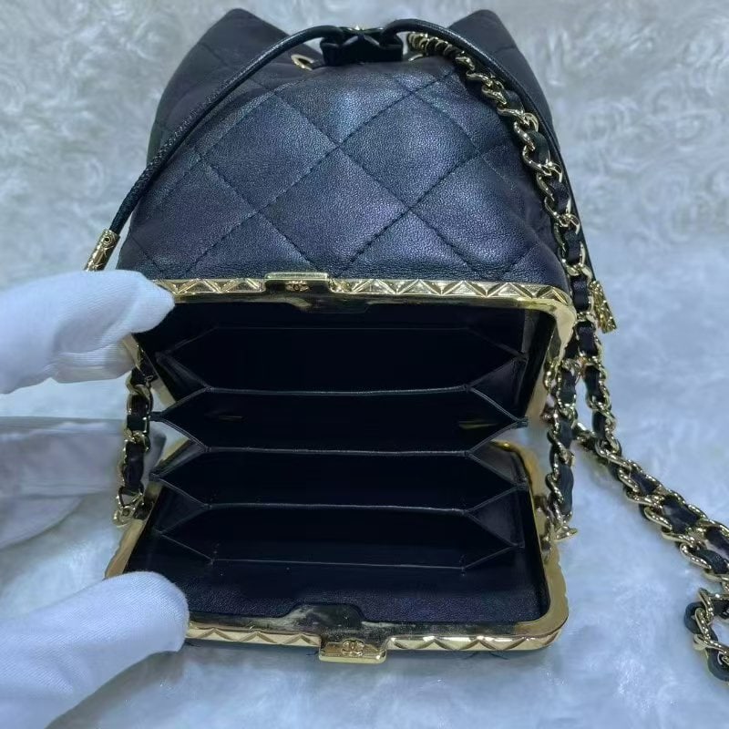 CHANEL Black Quilted Lambskin Leather Small Bucket Bag With Gold Hardware: Item Name:Chanel Black Quilted Lambskin Leather Small Bucket Bag With Gold Hardware Brand: CHANEL Model No.:32004874 Size:11cm*14cm*8cm Color:Black Material:Lambskin Accessories:N/A