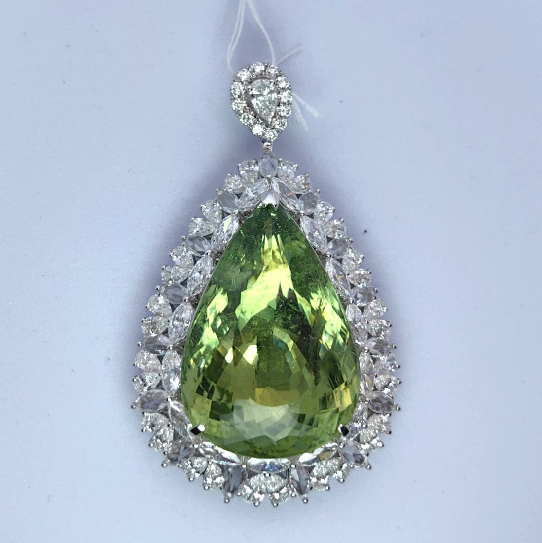 K18 Paraiba Tourmaline Yellow Diamond Pendant: Type: Pendant Metal:K18 White Gold Paraiba:43.92ct Diamond:6.25ct Size:N/A Signed By: N/A Additional Information: AIGS