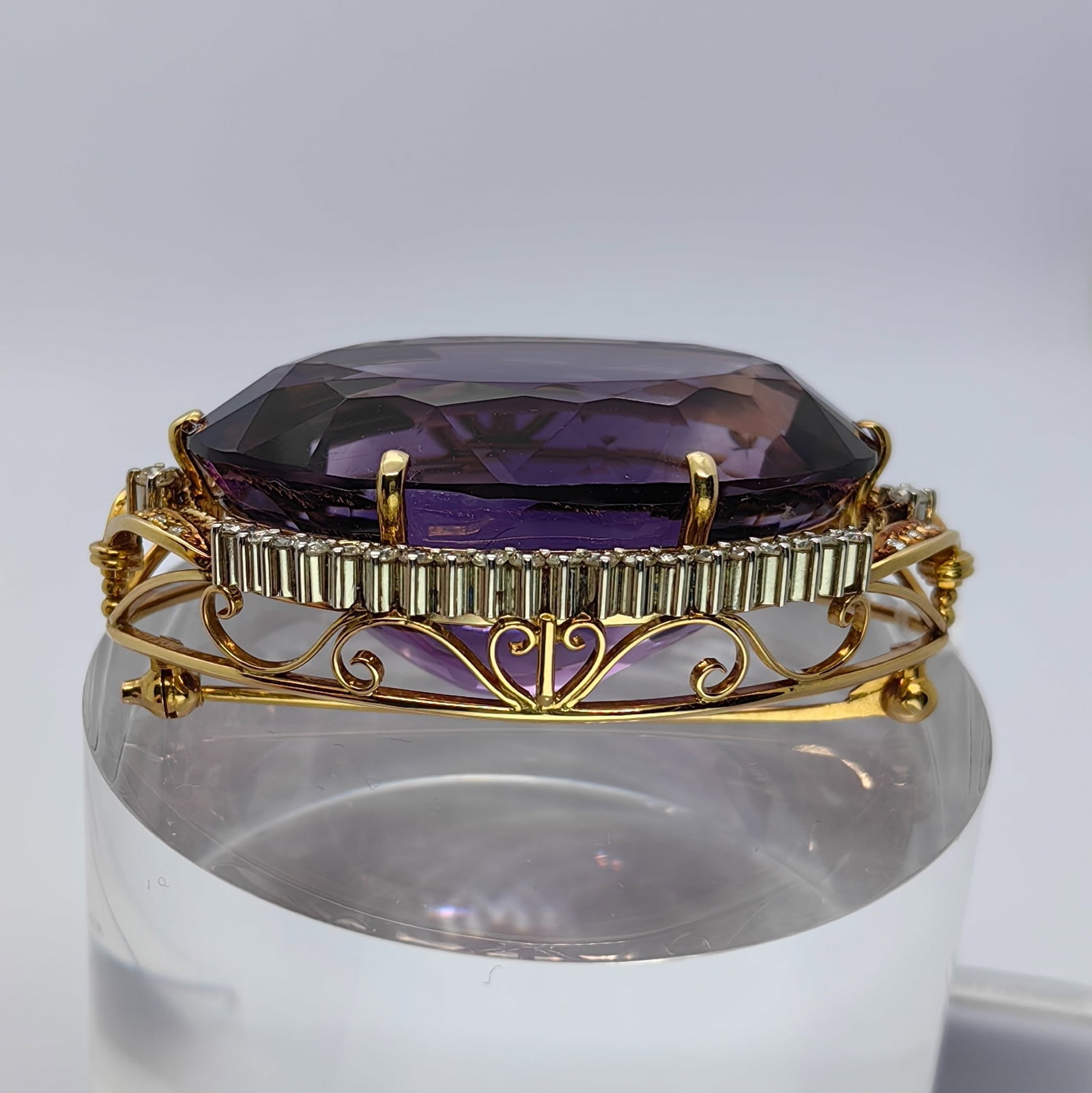 K18/PT900 Amethyst Diamond Brooch: Type: Brooch Metal:K18 Yellow Gold/Platinum Amethyst:93.78ct Diamond:1.20ct Size:N/A Signed By: N/A