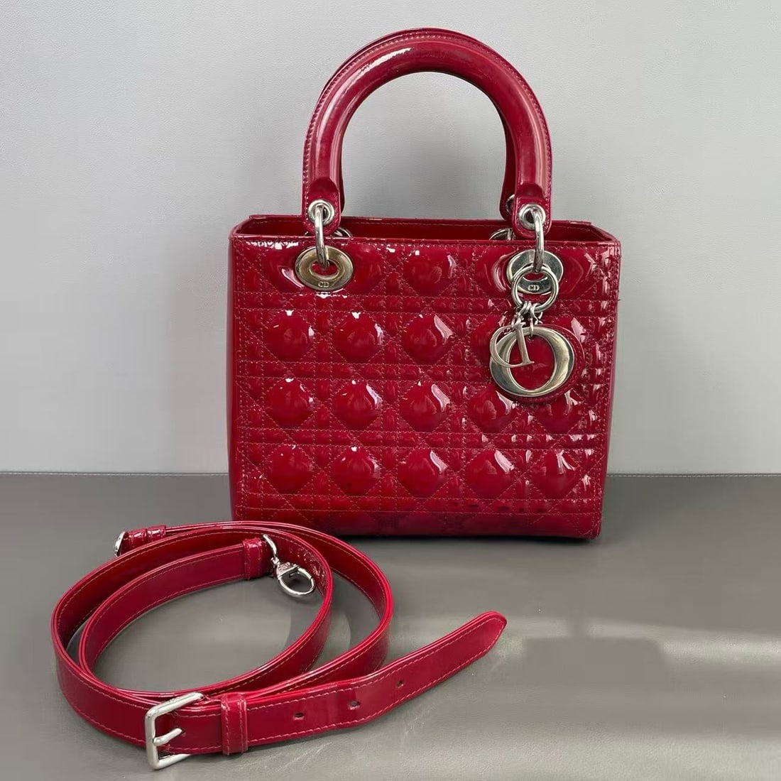 CHRISTIAN DIOR Lady Dior Small Bag: Item Name: Christian Dior Lady Dior Cannage Small Bag Brand: CHRISTIAN DIOR Model No.: 05-MA-0192 Sizs:24cm*20cm*11cm Color:Red Material:Patent Calfskin Leather Strap drop length: 45cm Accessories:N/A