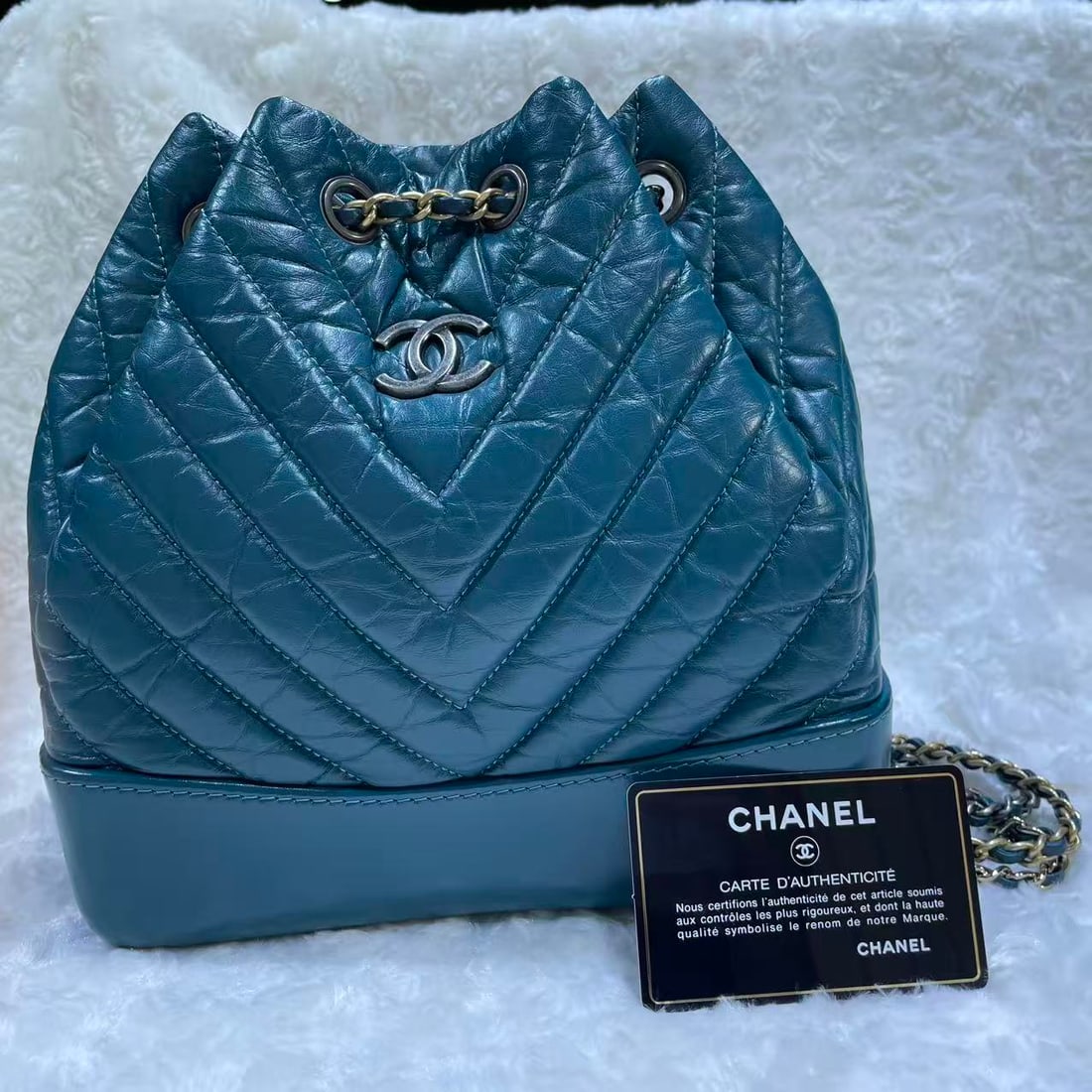 CHANEL Gabrielle Small Leather Backpack: Item Name:Chanel Gabrielle Small Leather Backpack Brand:CHANEL Model No.:27288761 Sizs:22cm*22cm*10cm Color:Darker Green Material:Lambskin Accessories:Card