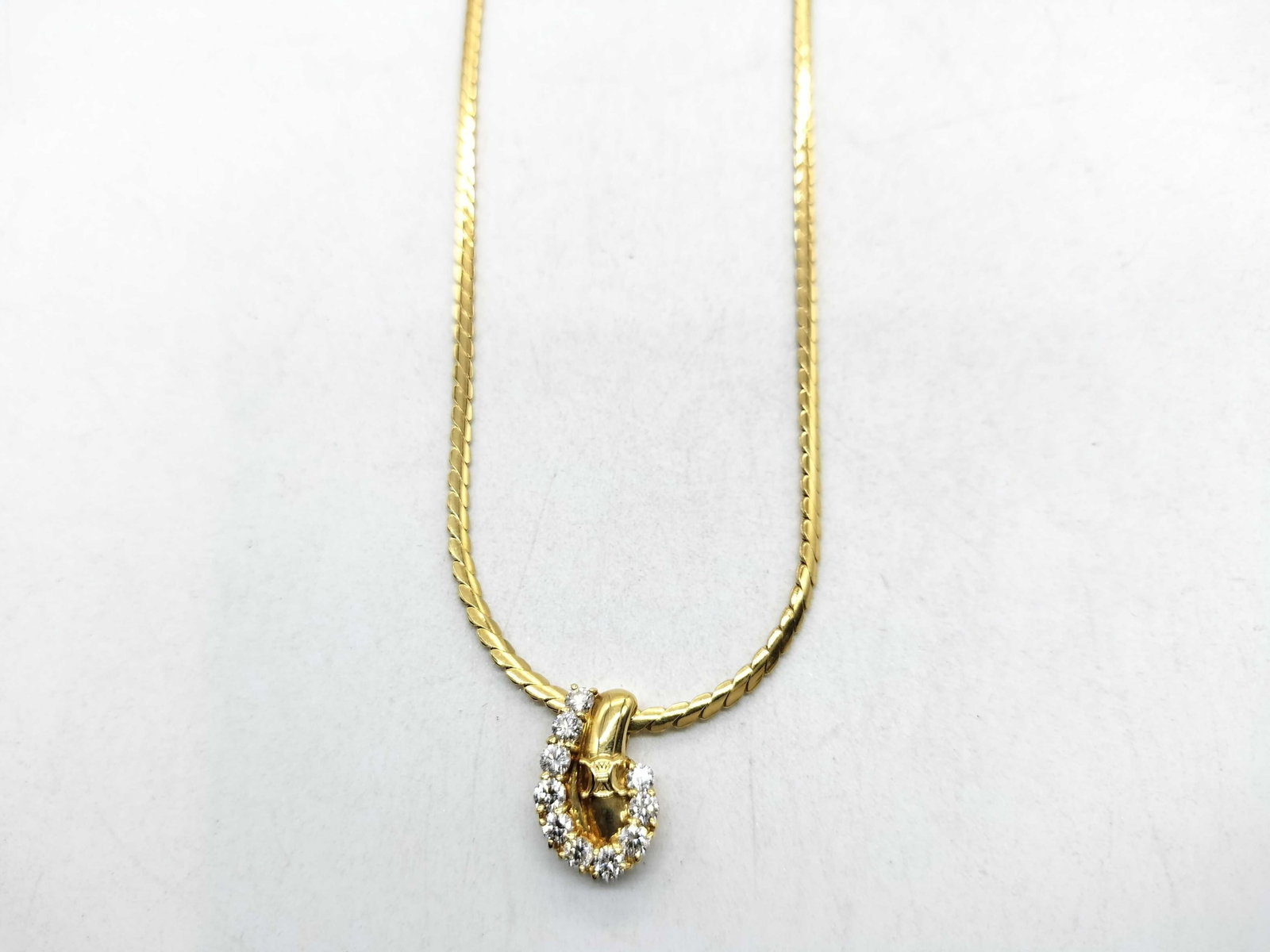 CELINE K18 NECKLACE: Type:NECKLACE Item Name:CELINE K18 NECKLACE Brand:CELINE Diamond:0.60ct Metal:18K Size:40.5cm Accessories:BROKEN BOX/CARD