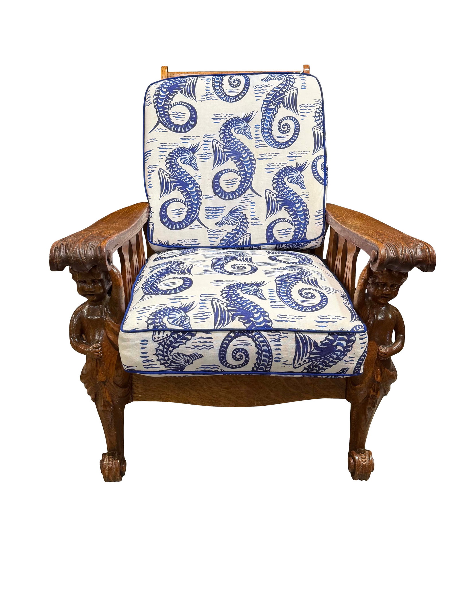 AMERICAN OAK MORRIS CHAIR WITH CHERUB FIGURES 40"H X 32"W X 31"D (1 of 3)