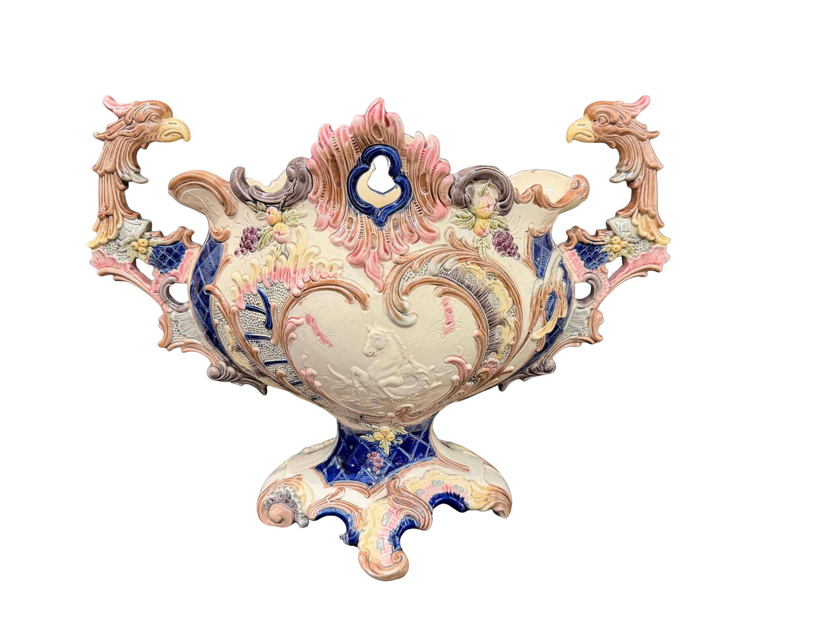 MAJOLICA CENTER PIECE WITH BIRD HANDLES HAS REPAIR ON ONE HANDLE AND MINOR CHIPS,SIZE 15"H X 19"W X: MAJOLICA CENTER PIECE WITH BIRD HANDLES HAS REPAIR ON ONE HANDLE AND MINOR CHIPS,SIZE 15"H X 19"W X 8"D