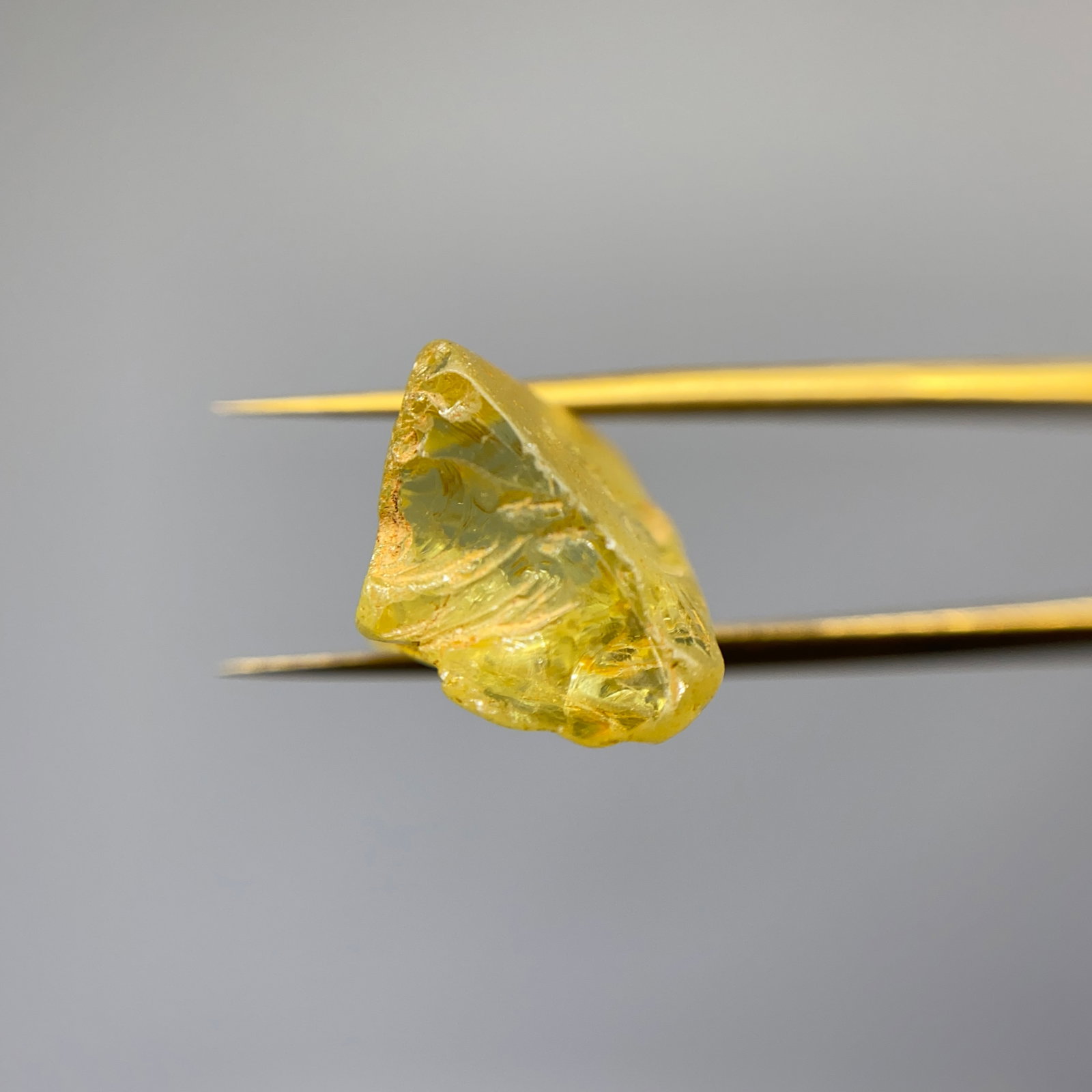 Rare Rough Sapphire Mineral Specimen: A naturally formed 10.85ct rough sapphire showcasing raw, earth-mined characteristics. Raw sapphire boasting over 10 carats of mass is an exceptionally rare find. Personally reviewed and authenticated