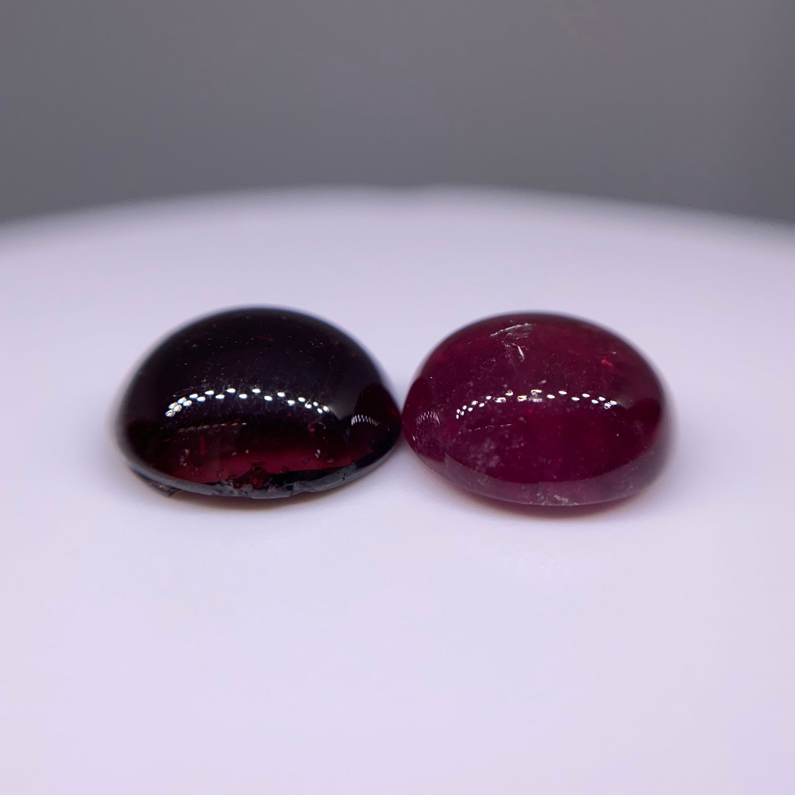 Rare Natural Garnet Cabochon Pair: A beautifully matched 12.70ct set of high-dome garnet cabochons showing excellent deep red body color. Finding a perfectly matched 12.70ct pair of deep red garnet cabochons is extremely difficult. Per