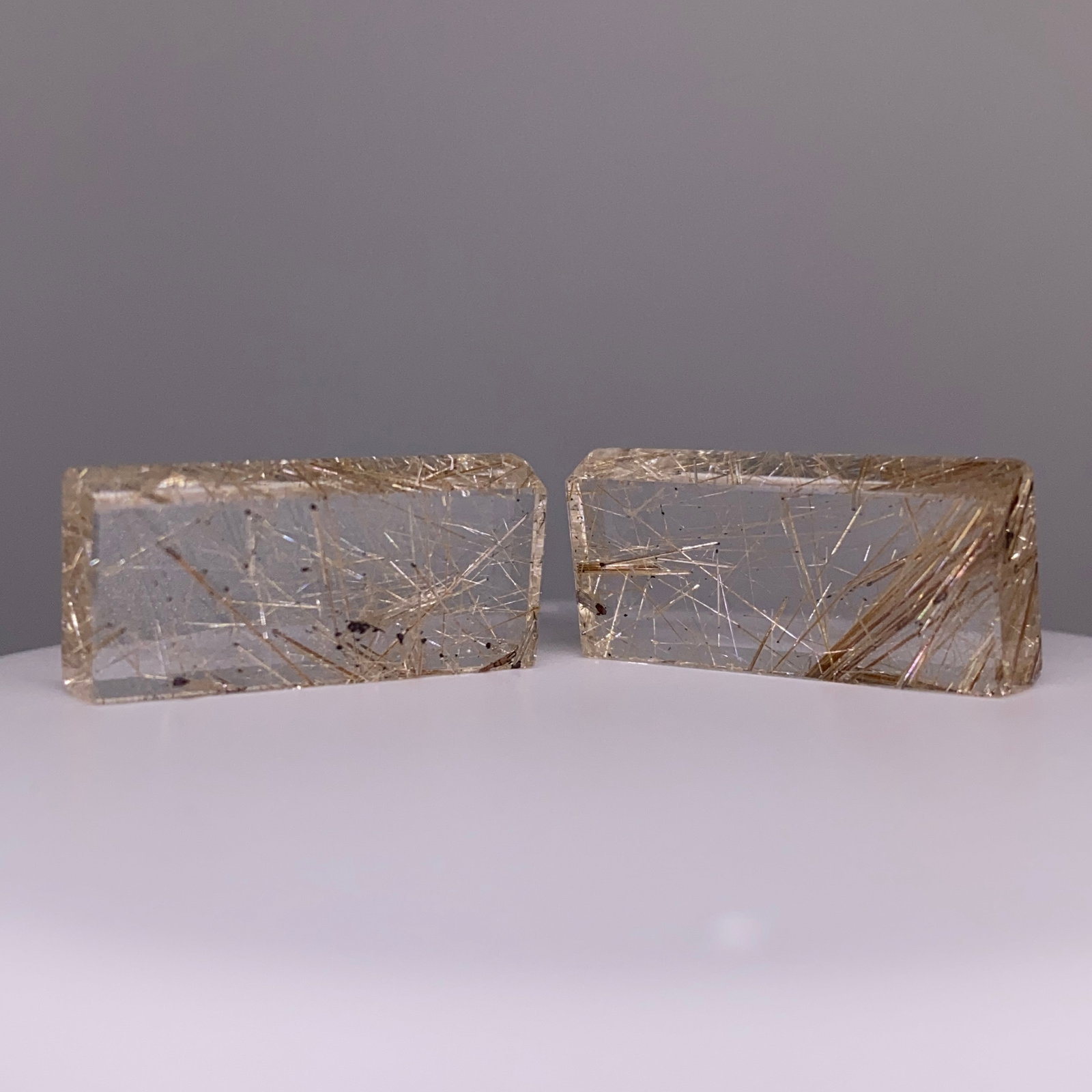 Rare Quartz Crystal Bars Pair by Francis J. Sperisen: A unique 31.96ct pair of lapidary-cut quartz bars with exceptional optical purity, suitable for custom architectural jewelry. Optical purity in custom lapidary-cut quartz bars is extremely rare to ach