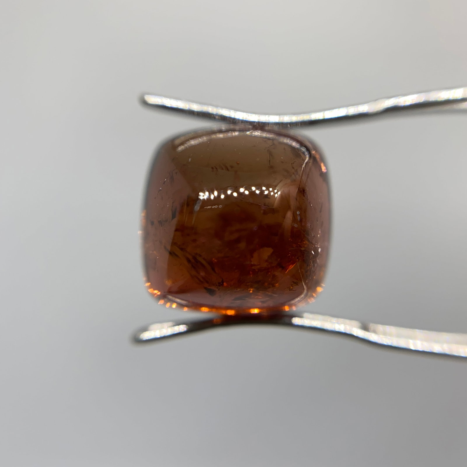 Rare Natural Garnet Cabochon Gemstone: A rich, dark red 5.87ct natural garnet polished into a smooth cabochon with an excellent, symmetrical dome. Dark, flawless red garnets nearing 6 carats are seldom found with such symmetrical doming. P