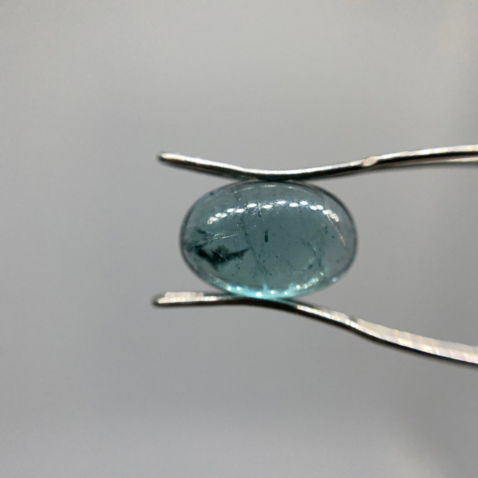 Rare Natural Blue Tourmaline Cabochon: A smoothly polished 2.28ct blue tourmaline cabochon showing dense color saturation and a pleasing symmetrical cut. Dense color saturation in indicolite cabochons is exceptionally scarce. Personally re