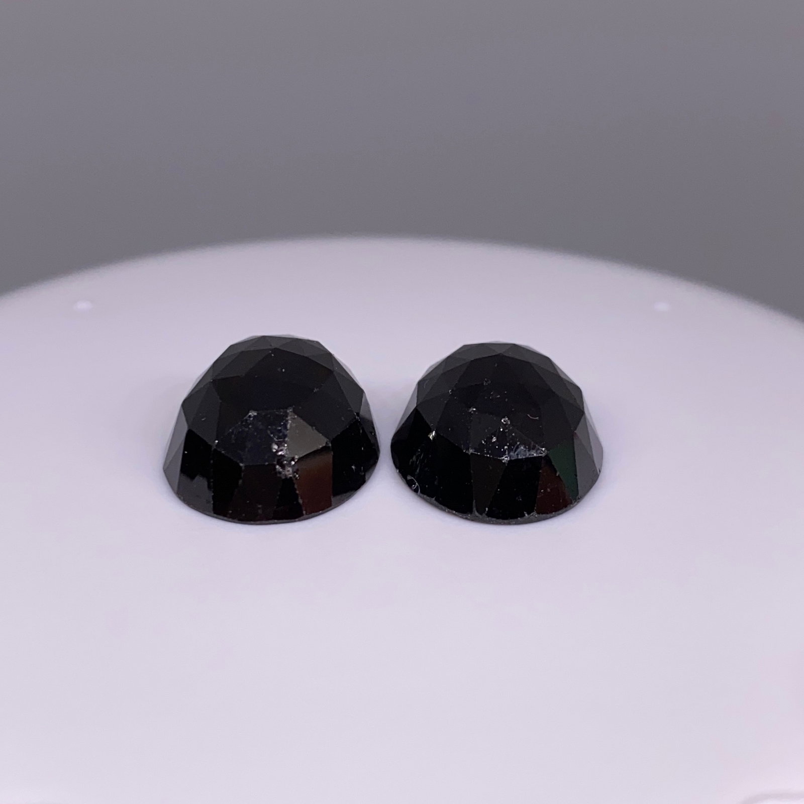 Rare Natural Garnet Cabochon Pair: A massive 29.07ct pair of high-polish garnet cabochons showing deep, velvety red saturation and excellent domed proportions. Massive 29-carat matched pairs of velvety red garnet cabochons are virtuall