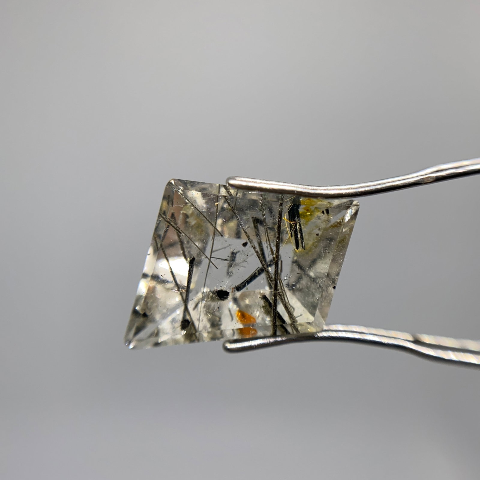 Rare Natural Rutilated Quartz Crystal by Francis J. Sperisen: A fascinating 6.03ct quartz gemstone prominently displaying striking, golden rutile needle inclusions within clear crystal. Clear quartz packed with such distinct golden rutile needles is a rare natur