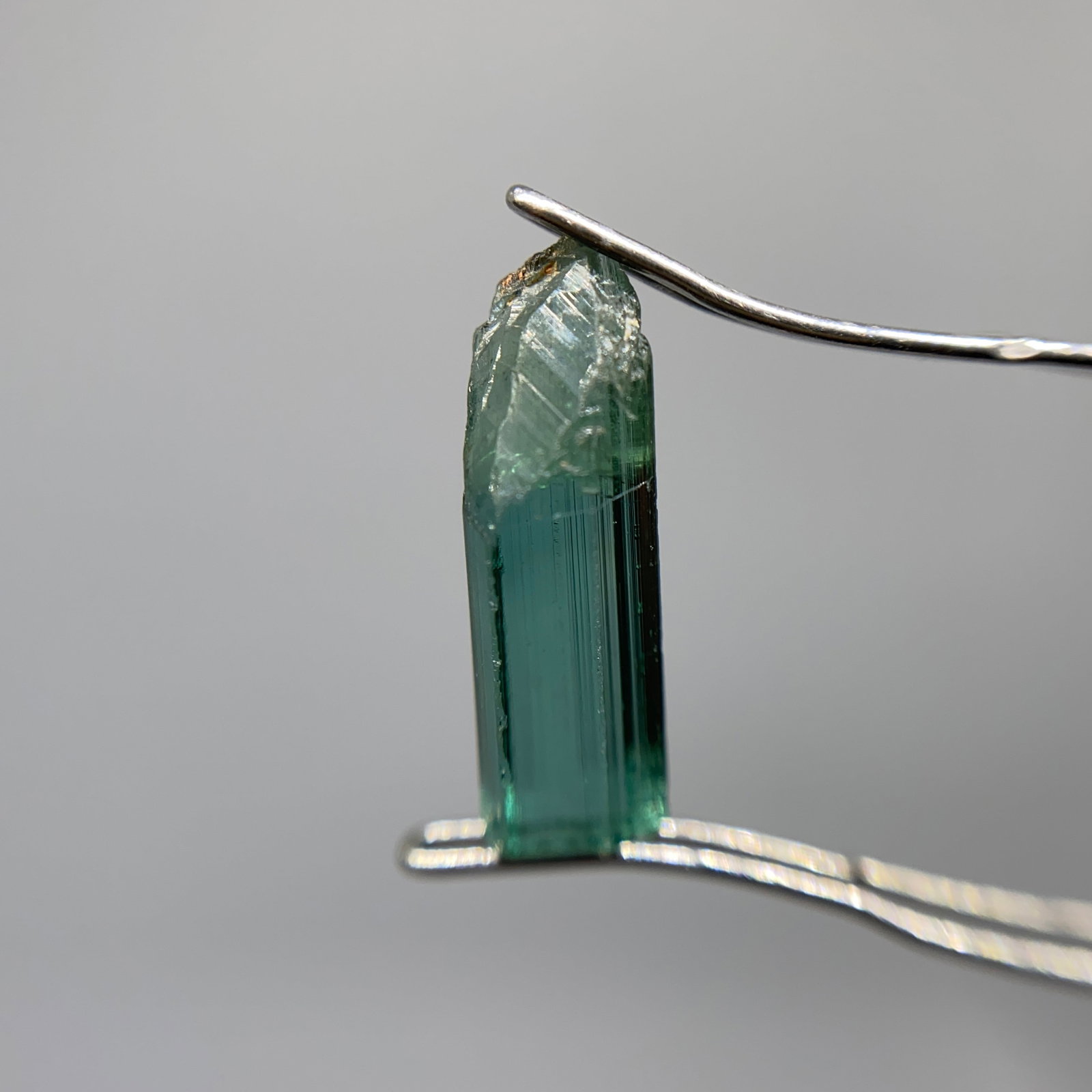 Rare Rough Blue Tourmaline Specimen: A natural, unheated 2.14ct blue tourmaline crystal showing strong pleochroism and excellent raw structure. Unheated blue indicolite crystals showing this strong pleochroism are true rarities. Personal
