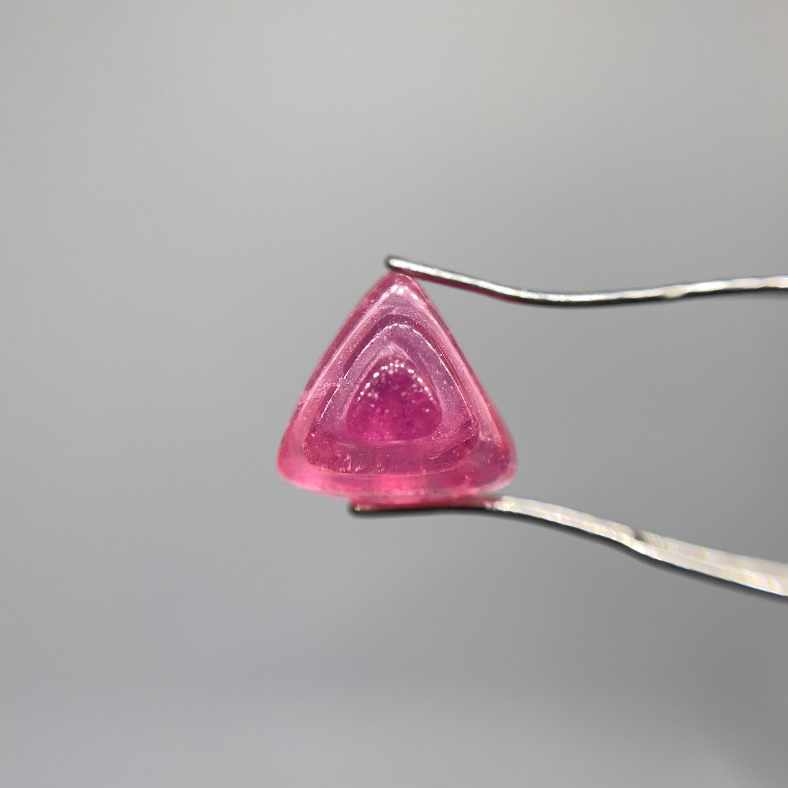 Rare Hand-Carved Pink Tourmaline Sculpture: An intricate 4.02ct artisan-carved natural pink tourmaline showing excellent color depth and fine lapidary detailing. Intricate artisan carving on 4-carat gem-grade tourmaline is highly unusual. Perso