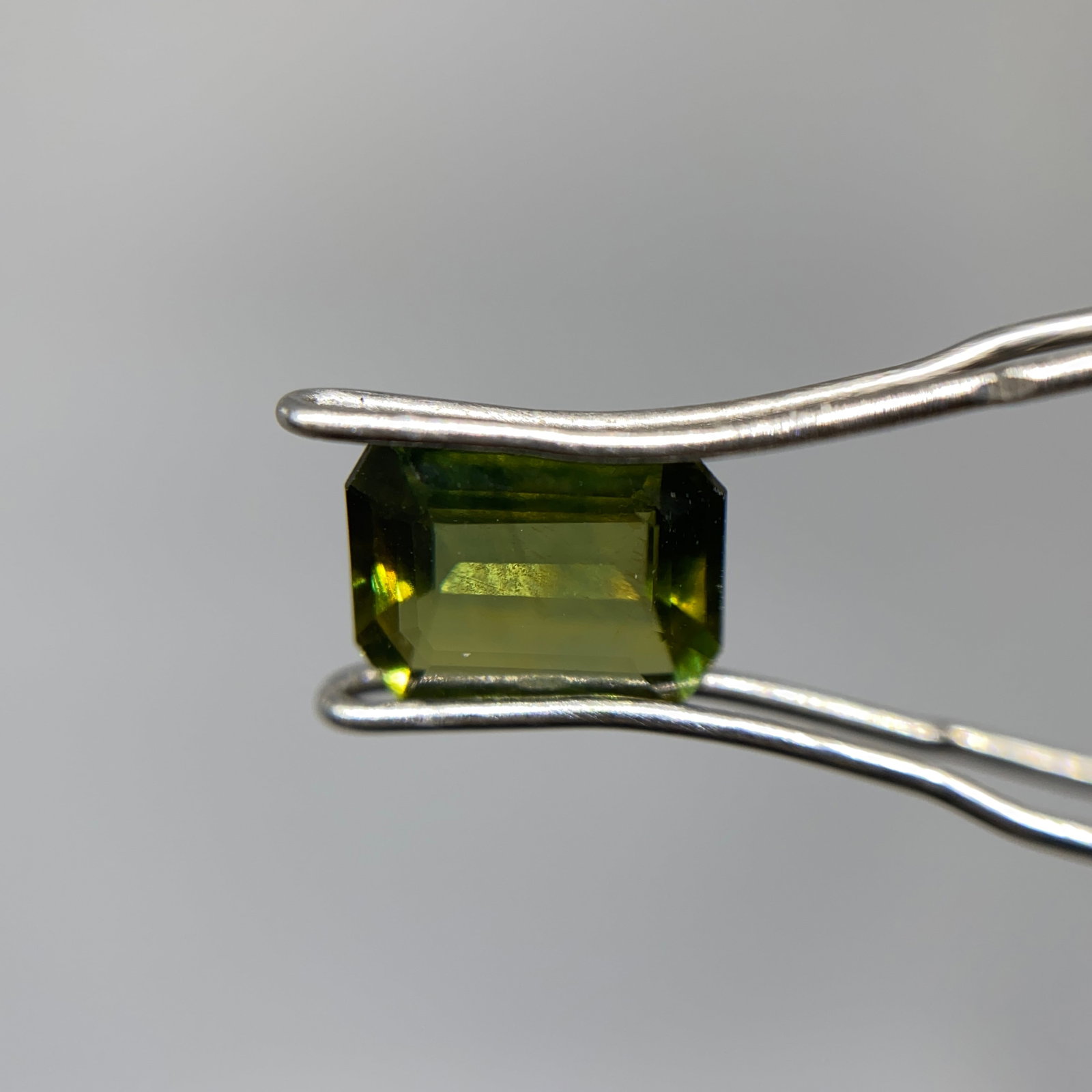 Rare Natural Green Sapphire Gemstone Pair: A perfectly matched 1.06ct pair of vibrant green sapphires, precision-cut and ready for bespoke earring settings. Perfectly matched, precision-cut vibrant green sapphires are extremely difficult to as
