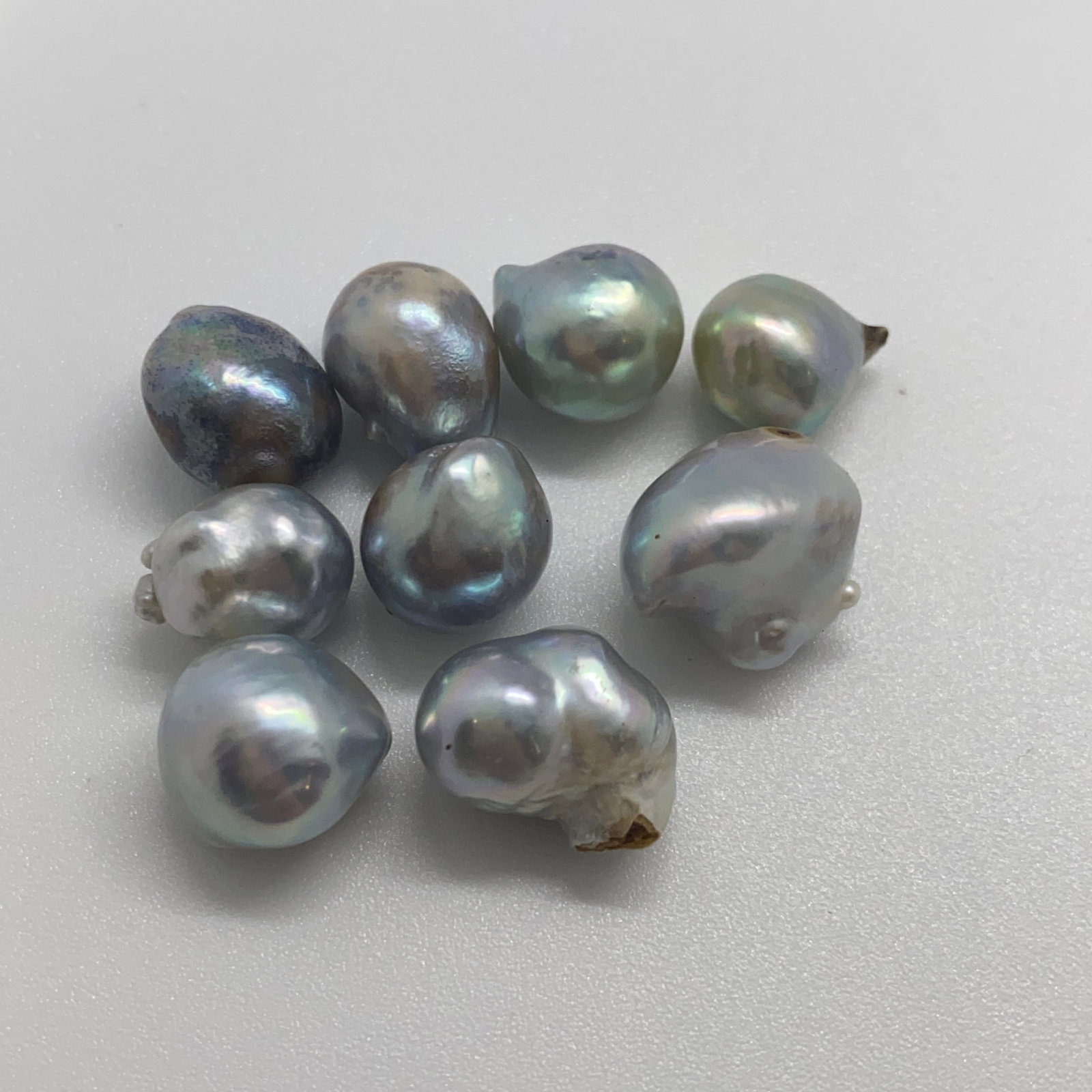 Rare Blue Pearl Wholesale Lot: An exceptional 61.77ct parcel of pearls noted for their remarkable blue-gray nacre and excellent organic shapes. Blue-gray nacre of this quality in a 61-carat parcel is a rare and prestigious collecti