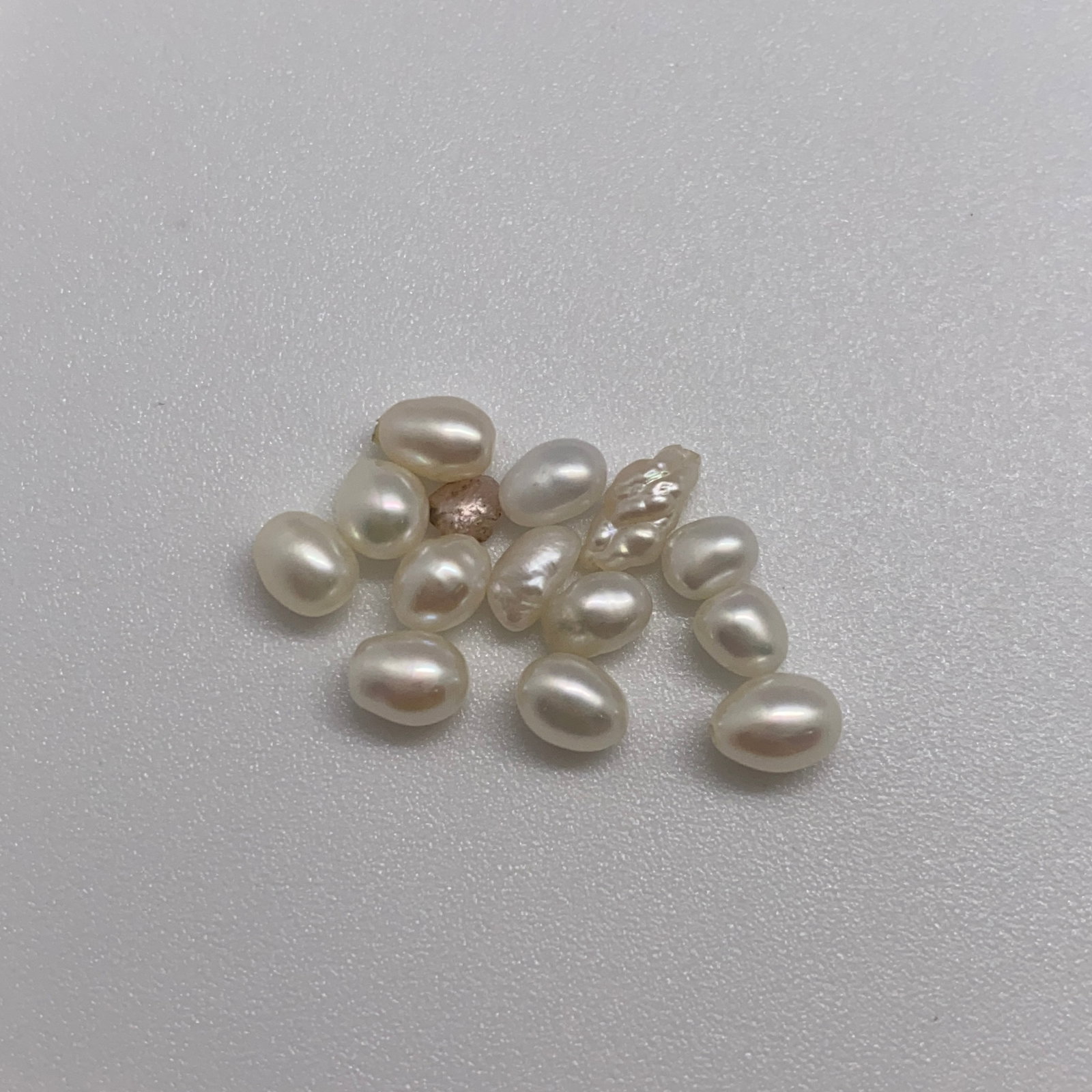 Rare Natural White Pearl Wholesale Lot: A bright, clean 7.27ct parcel of classic white pearls showing highly reflective surfaces and consistent nacre quality. Bright, classic white pearls with this consistent nacre quality are increasingly 