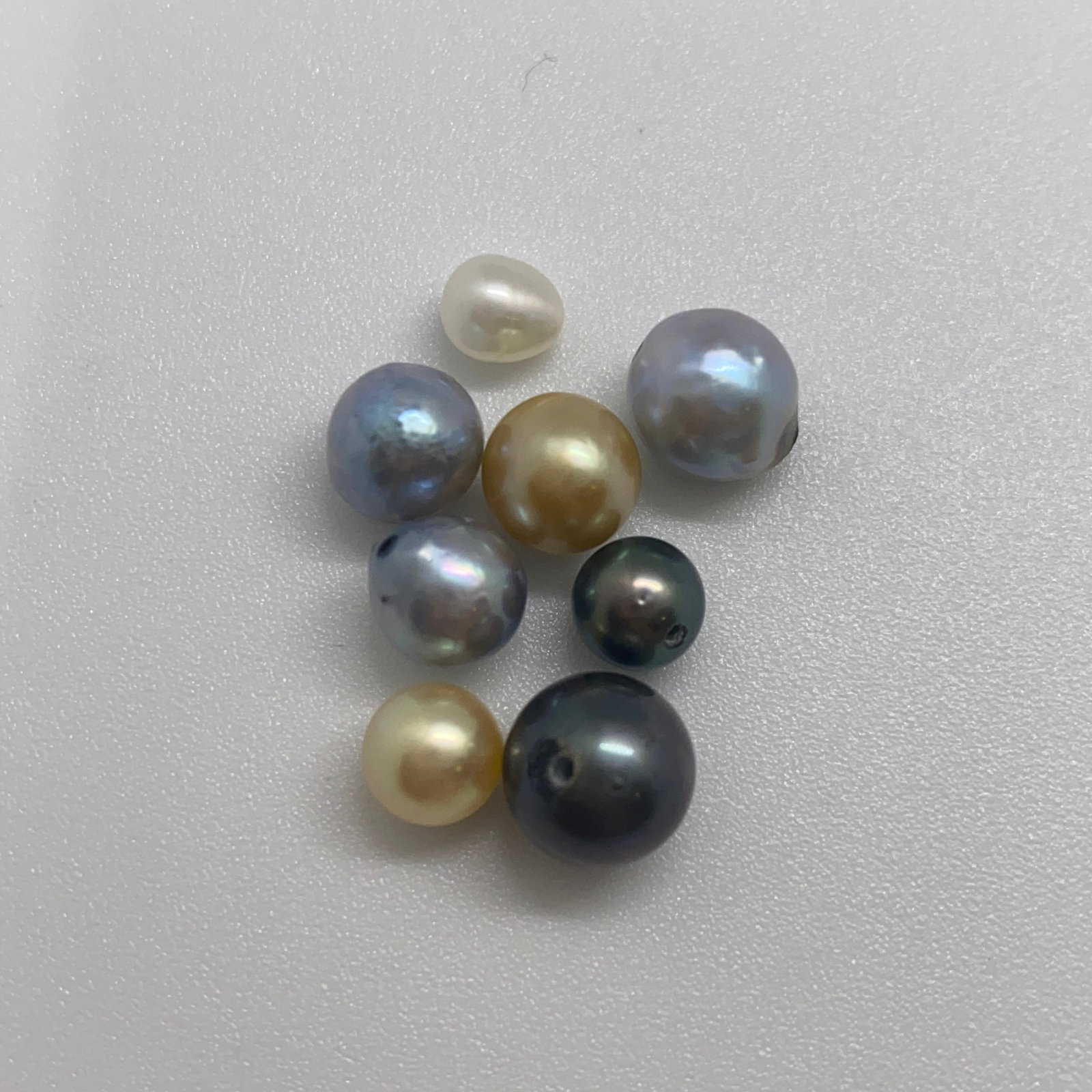 Rare Mixed Natural Pearl Lot: A curated 16.52ct assortment of varied natural pearls, offering a beautiful mix of organic textures and natural luster. Curated assortments of varied natural pearls with this luster are rarely collect