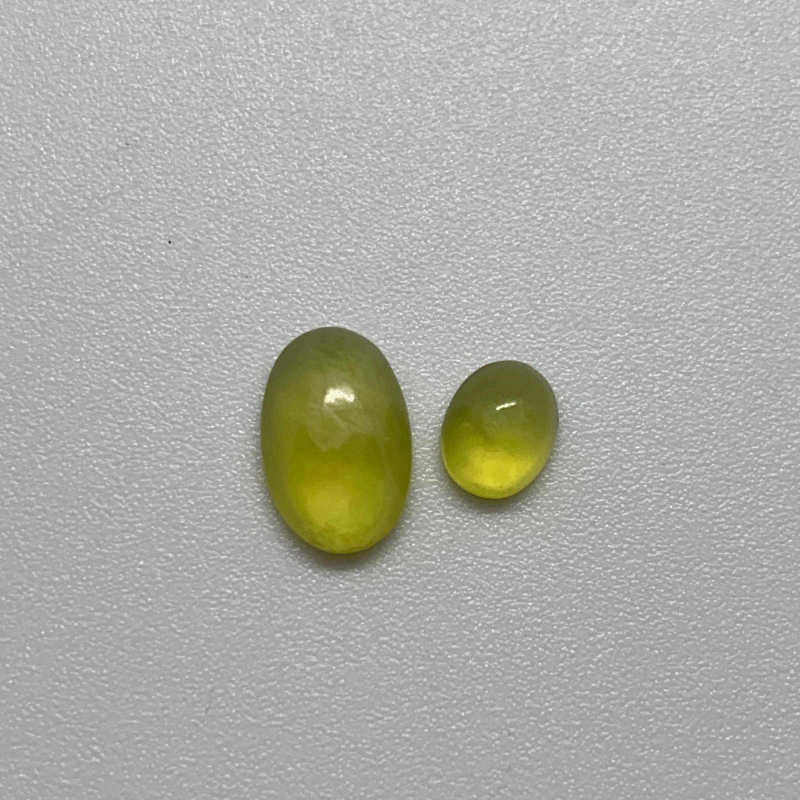 Rare Natural Yellow Moonstone Gemstone: A fine 2.59ct natural moonstone exhibiting a warm yellow body color and the stone's characteristic, glowing adularescence. Warm yellow moonstones exhibiting such glowing adularescence are rare gemston