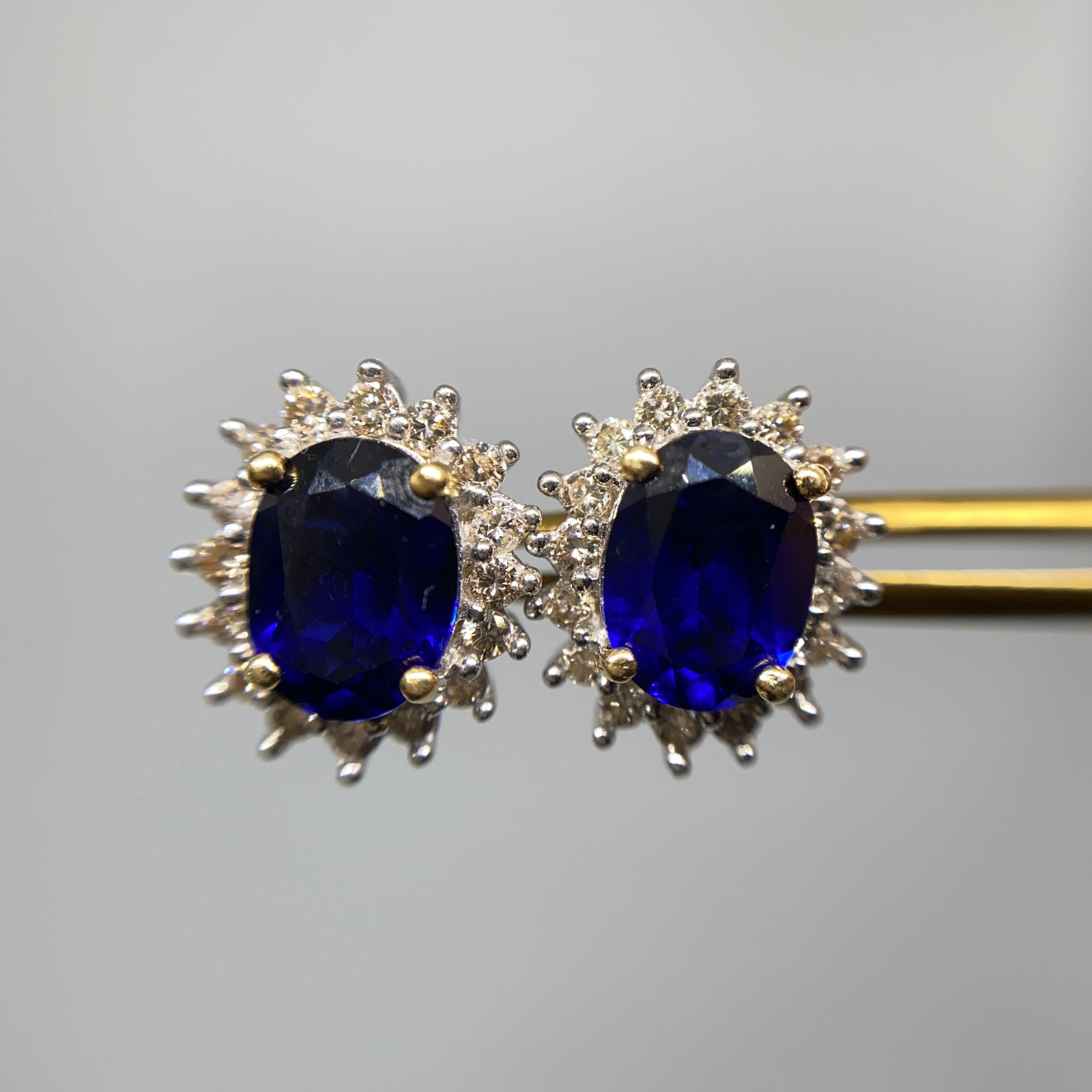 Heirloom 14K Gold Sapphire & Diamond Earrings: Beautifully matched 3.27g 14K gold earrings showcasing deep blue natural sapphires highlighted by sparkling diamond accents. Perfectly matched deep blue natural sapphires in 14K gold estate settings a