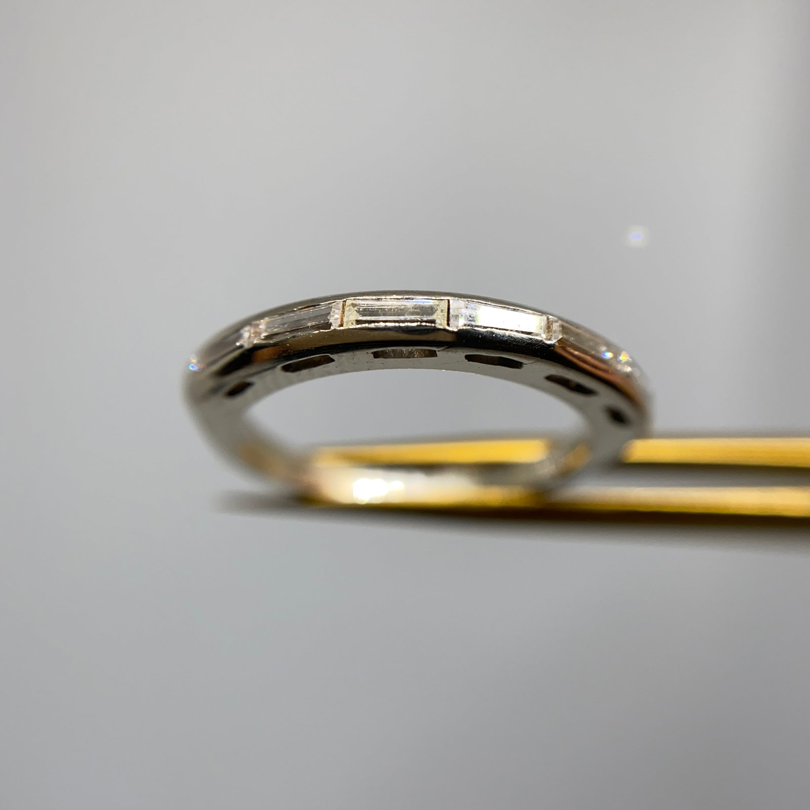 Heirloom 14K White Gold VVS Baguette Diamond Ring Size 6: A brilliant 2.42g 14K white gold band channel-set with exceptionally high-clarity (VVS) baguette-cut diamonds. Exceptional high-clarity VVS baguette diamonds channel-set in 14K gold are rare luxury pi