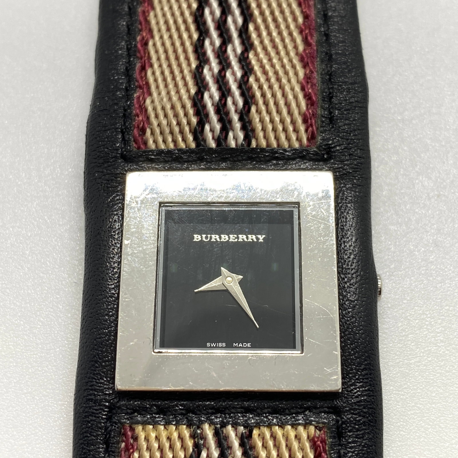Heirloom Burberry Swiss Quartz Luxury Wristwatch: A sophisticated 42.80g Swiss-made Burberry timepiece featuring a precise quartz movement and iconic brand styling, in fine estate condition. Swiss-made Burberry timepieces in such fine, precise estate