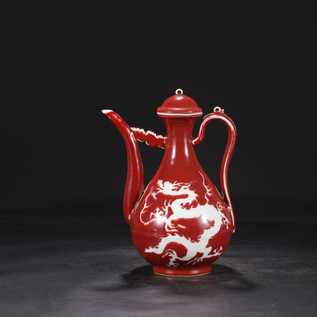A large pot with a red glaze left blank and carved cloud dragon pattern in the Yuan Dynasty: The Yuan Dynasty's Jihong glaze left blank and carved cloud dragon pattern large pots Size:D:31.5cm Calibre:7.5cm D:22.5cm (The Dimensions Of All Batches Are Manually Measured.If You Need More Detaile