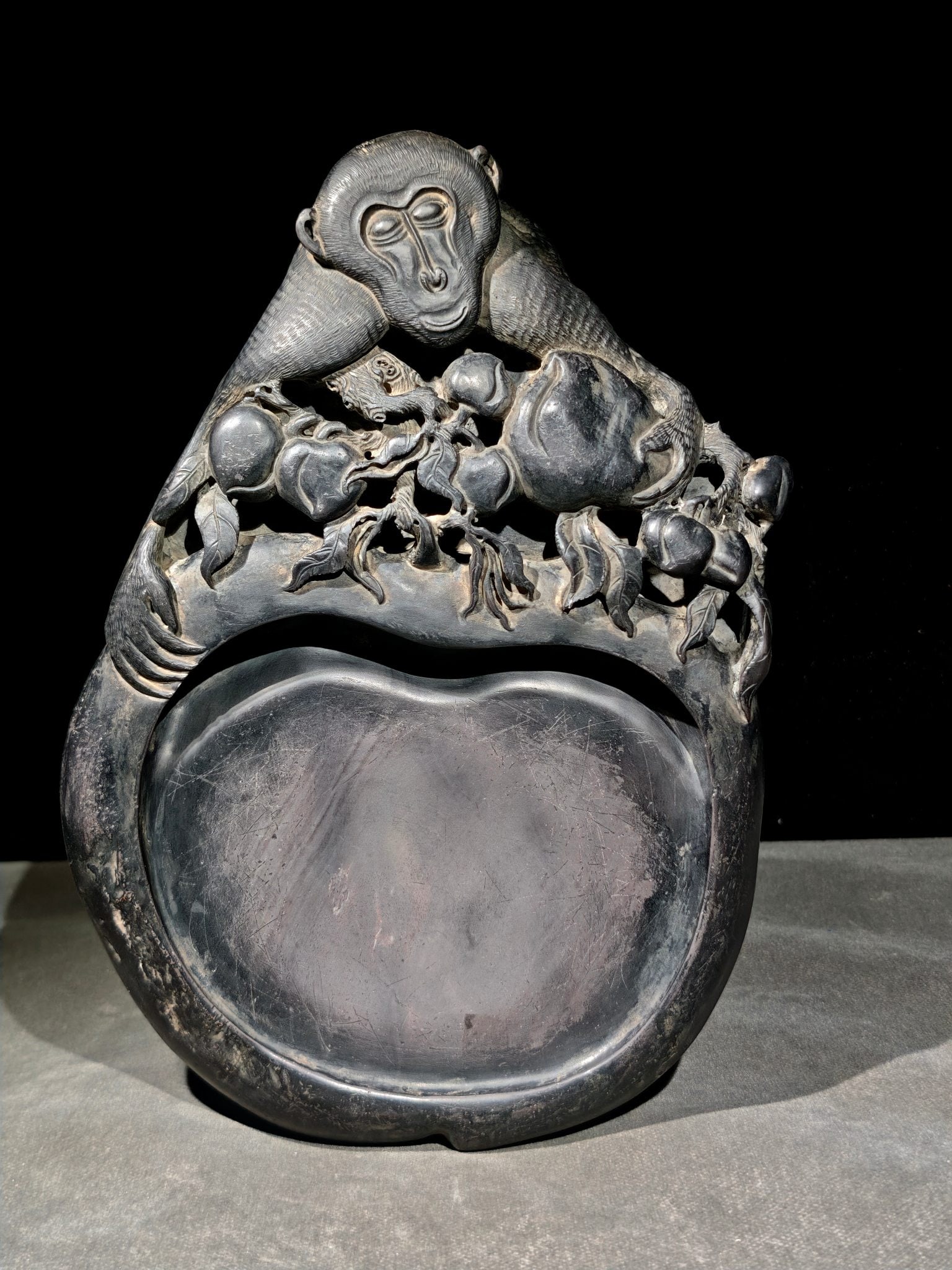 A beautiful spirit monkey offering a longevity inkstone (1 of 9)