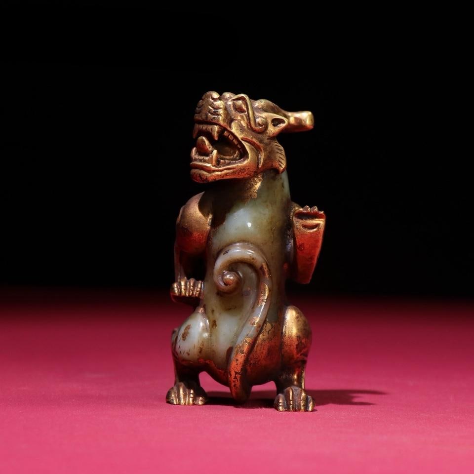 A beautiful Hetian seed material copper gilt auspicious beast: Exquisite Hetian seed material copper gilt auspicious beast Size:93x41x37mm W:186g (The Dimensions Of All Batches Are Manually Measured.If You Need More Detailed Information, Please Contact Our Custom