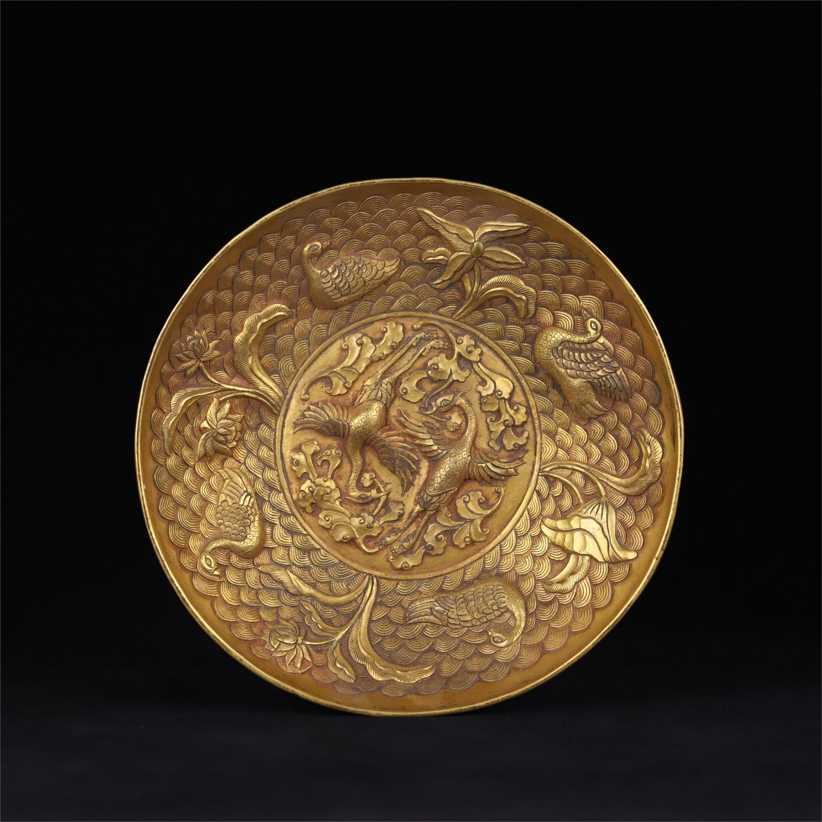 A copper-gilt seawater beast pattern plate from the Tang Dynasty: Tang Dynasty copper gilt seawater auspicious beast pattern plate Size:D:18.4cm H:4.3cm W:0.4203kg (The Dimensions Of All Batches Are Manually Measured.If You Need More Detailed Information, Please Con
