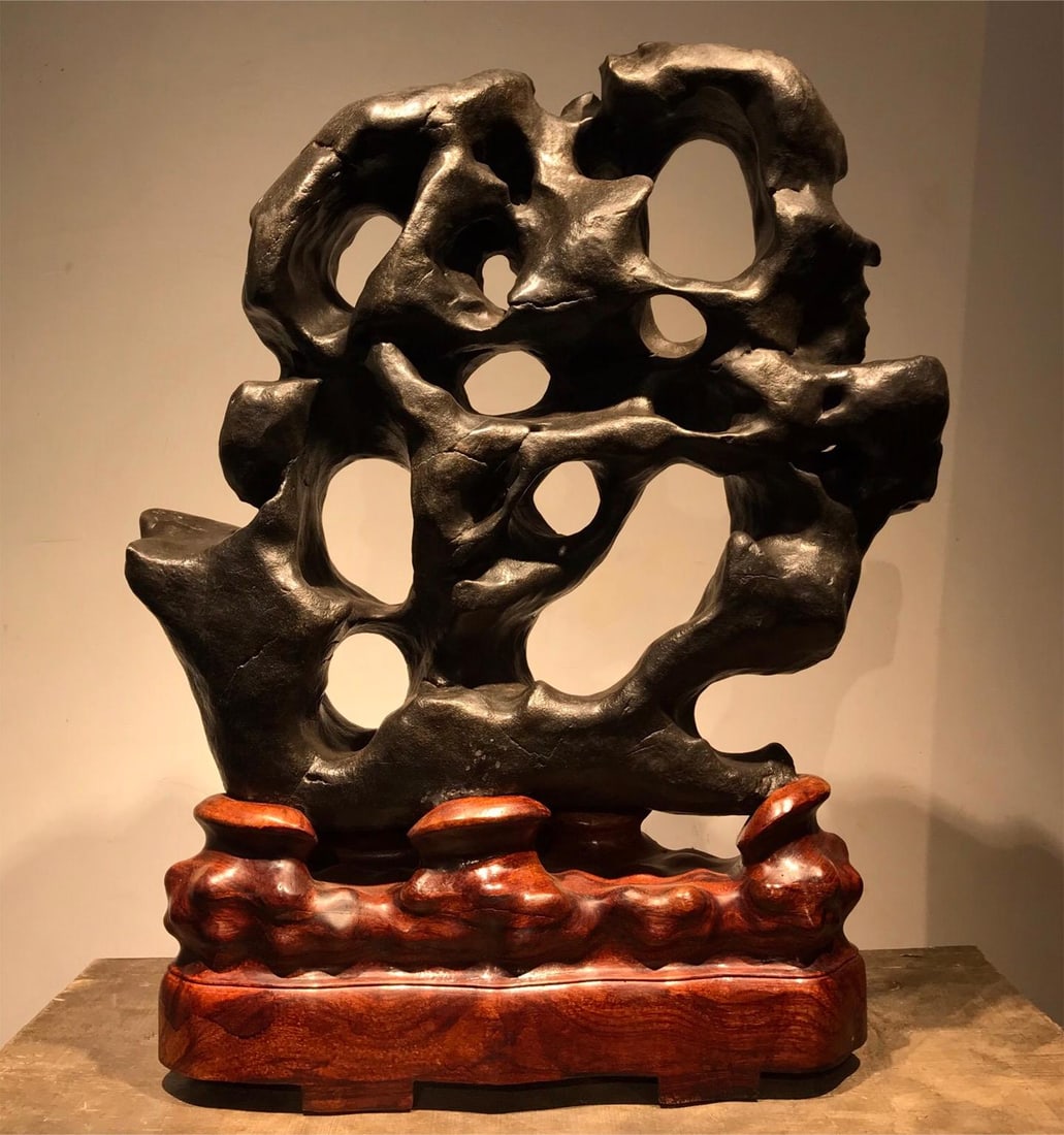 A piece of exquisite Taihu Lake Shilangyun: Exquisite Taihu Lake Shilangyun Size:H:72cm W:55cm T:17cm (The Dimensions Of All Batches Are Manually Measured.If You Need More Detailed Information, Please Contact Our Customer Service Before Bidding