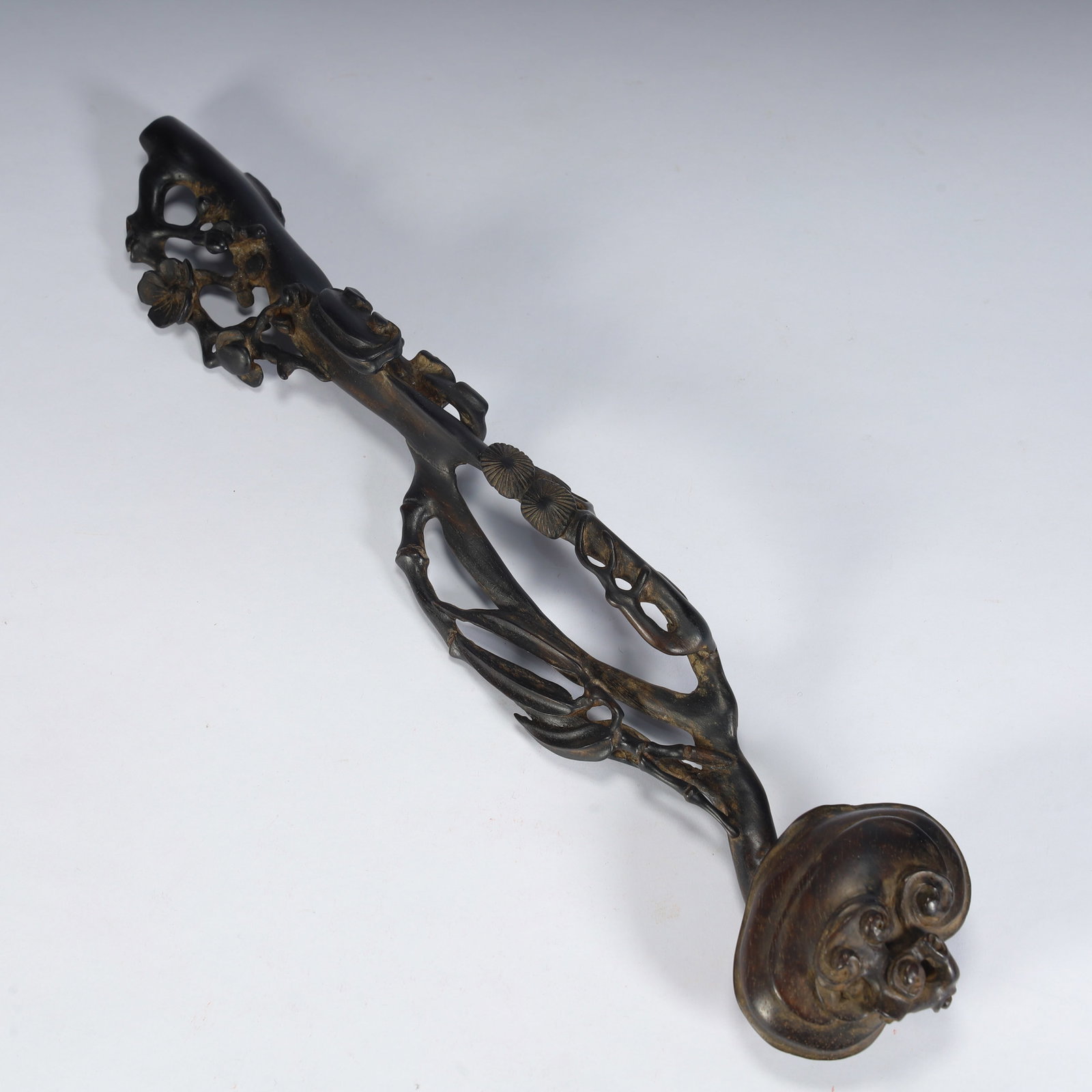 A Qing Dynasty rosewood cold three friends Ganoderma lucidum pattern ruyi ornament: Qing Dynasty's red sandalwood cold three friends Ganoderma lucidum pattern ruyi ornament SIZE:L: 29cmW: 5cmW: 62g (The Dimensions Of All Batches Are Manually Measured.If You Need More Detailed Informa