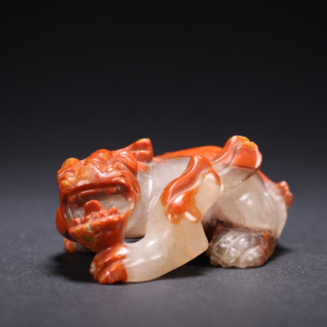 A piece of the Red Auspicious Beast from the Warring States Period: The red beast of the Warring States period Size:6.3x4x2cm W:0.057kg (The Dimensions Of All Batches Are Manually Measured.If You Need More Detailed Information, Please Contact Our Customer Service