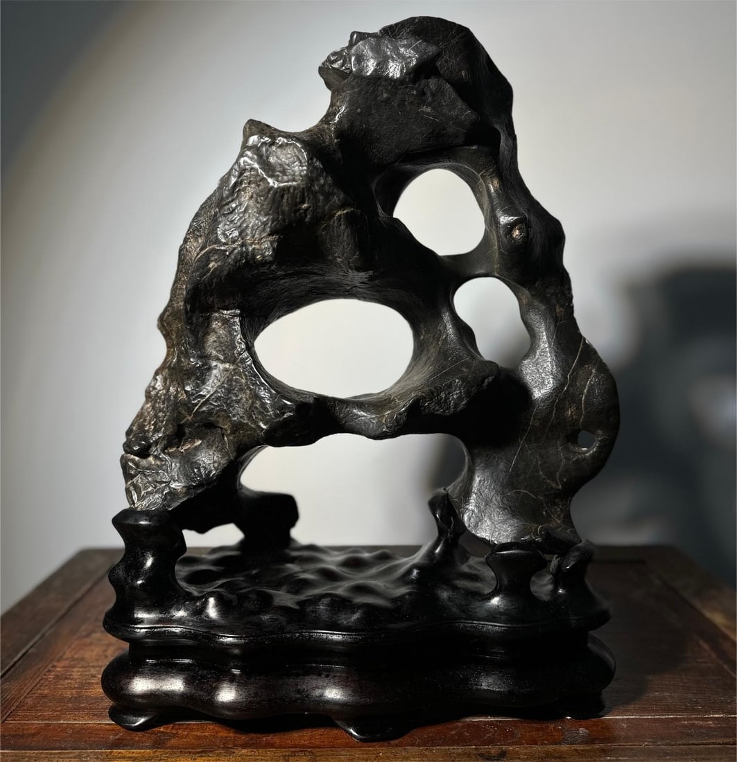 A piece of exquisite Taihu Lake grottoes cloud: Exquisite Taihu Lake Grottoes Cloud Size:H:54cm W:38cm T:19cm (The Dimensions Of All Batches Are Manually Measured.If You Need More Detailed Information, Please Contact Our Customer Service Before Bid