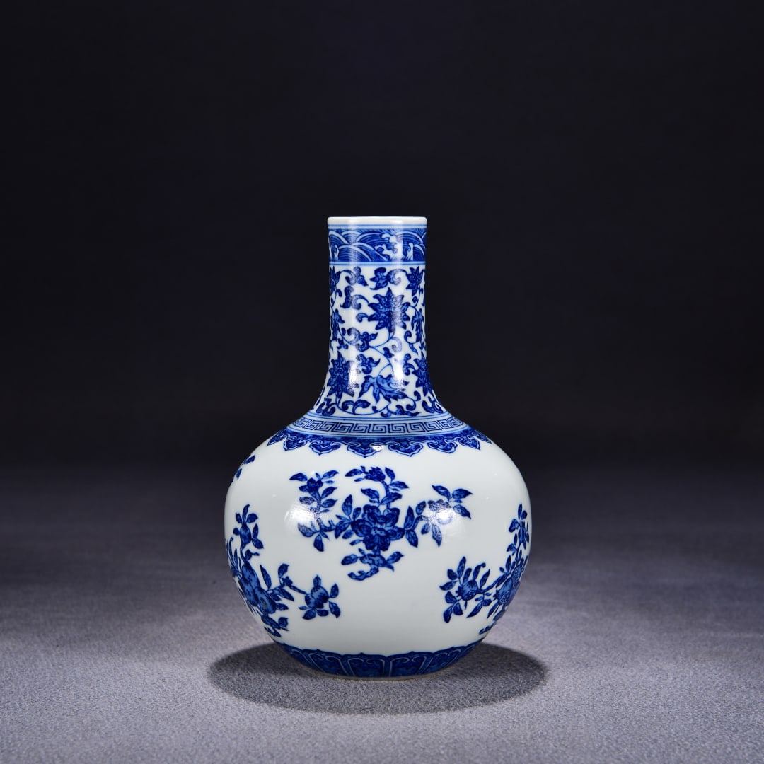 A blue and white broken branch flower and fruit pattern heavenly ball vase made in the Qianlong (1 of 9)