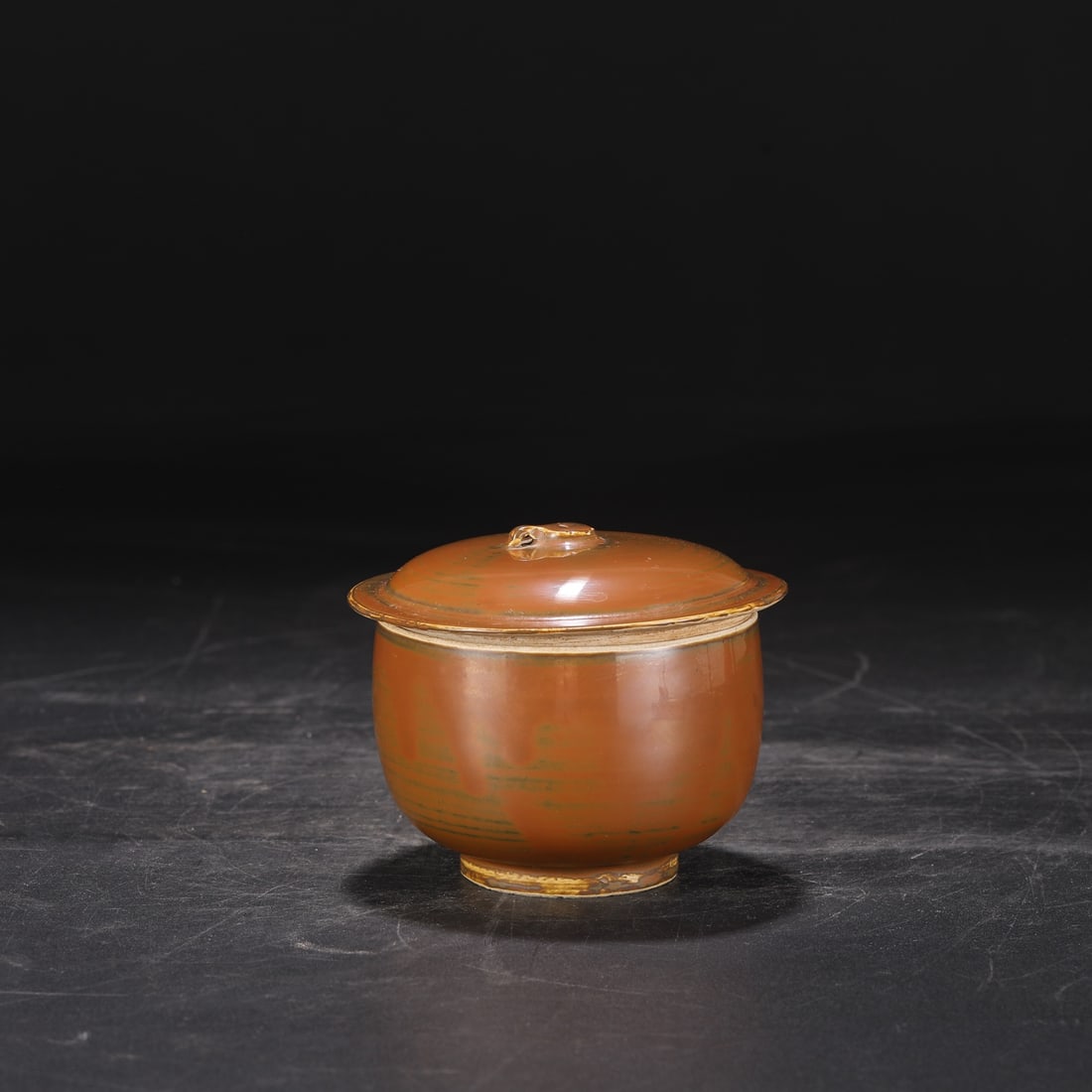 A purple gold glazed tea bowl from the Song Dynasty Ding kiln: The purple gold glazed lid tea bowl of the Song Dynasty Ding kiln Size:H:9.5cm Calibre:10.5cm (The Dimensions Of All Batches Are Manually Measured.If You Need More Detailed Information, Please Contact