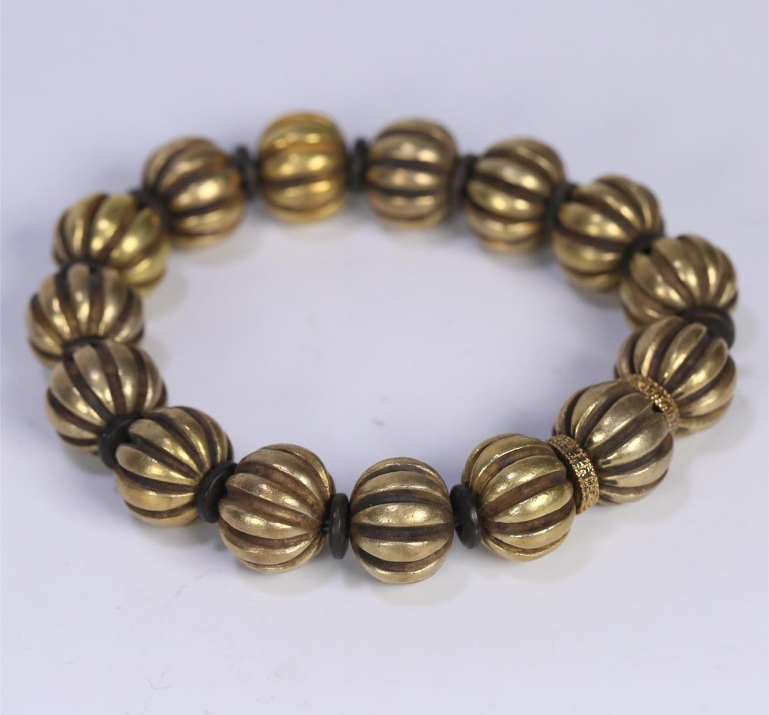 A silver-gilt melon bead bracelet from the Qing Dynasty: Qing Dynasty silver gilt melon bead bracelet Size:1.6cm W:0.0602kg (The Dimensions Of All Batches Are Manually Measured.If You Need More Detailed Information, Please Contact Our Customer Service Befor