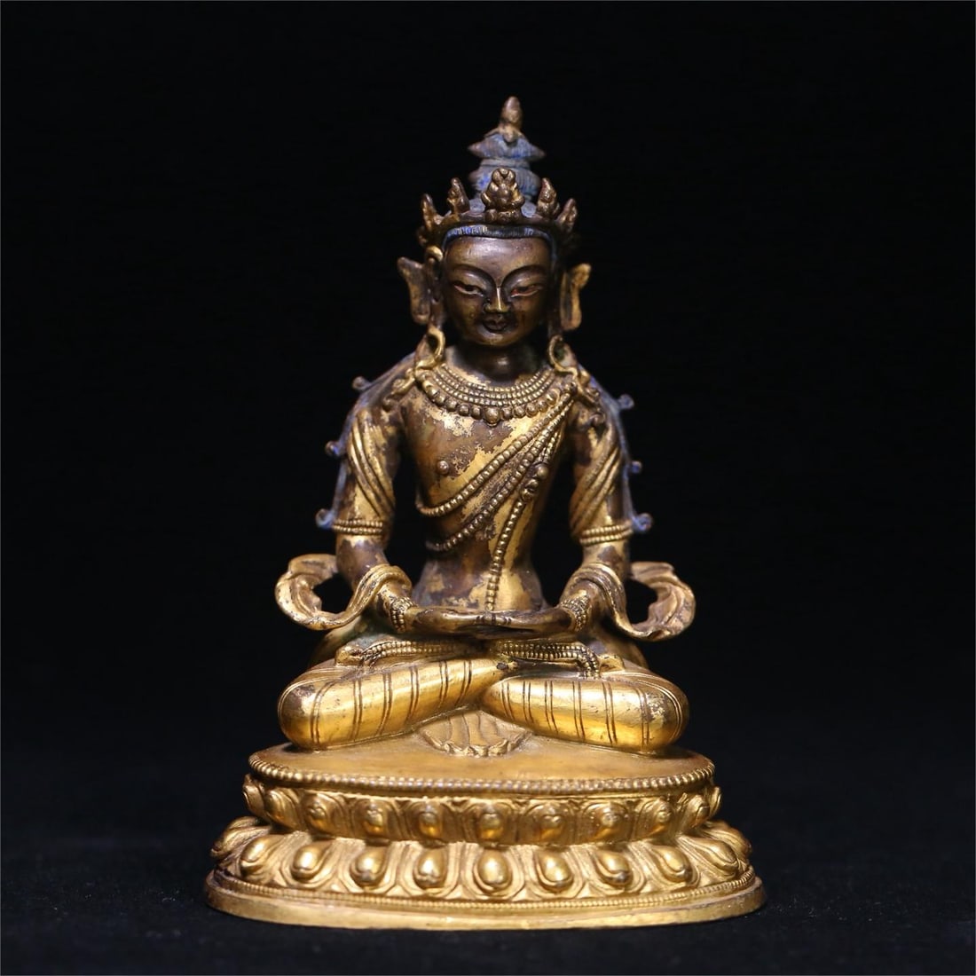 A copper-gilt longevity Buddha of the Qing Dynasty (1 of 7)